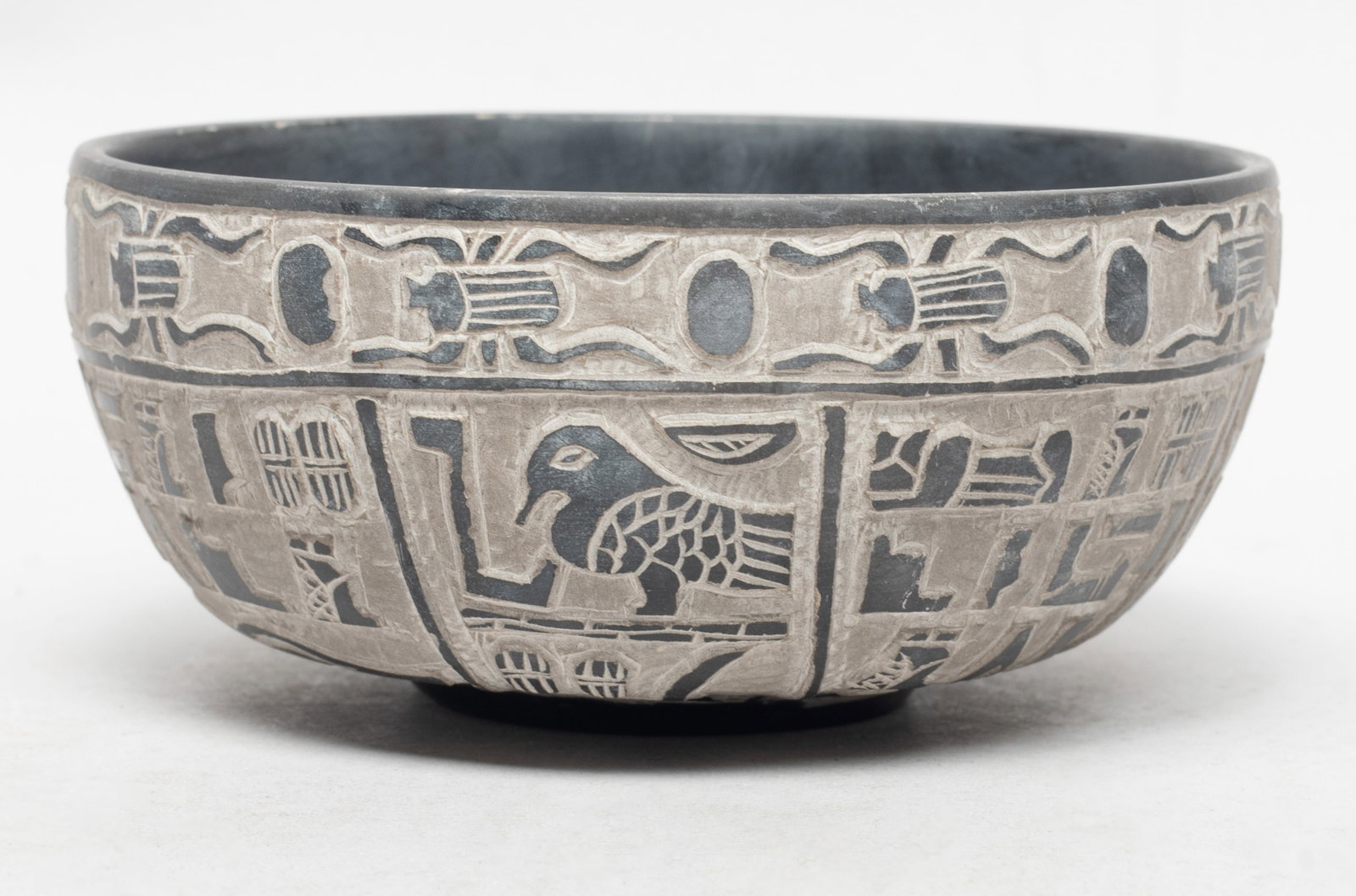 Egyptian Basalt Stone Carved Bowl: Egyptian type stone carved bowl. Approx. 5*2.2 inch.