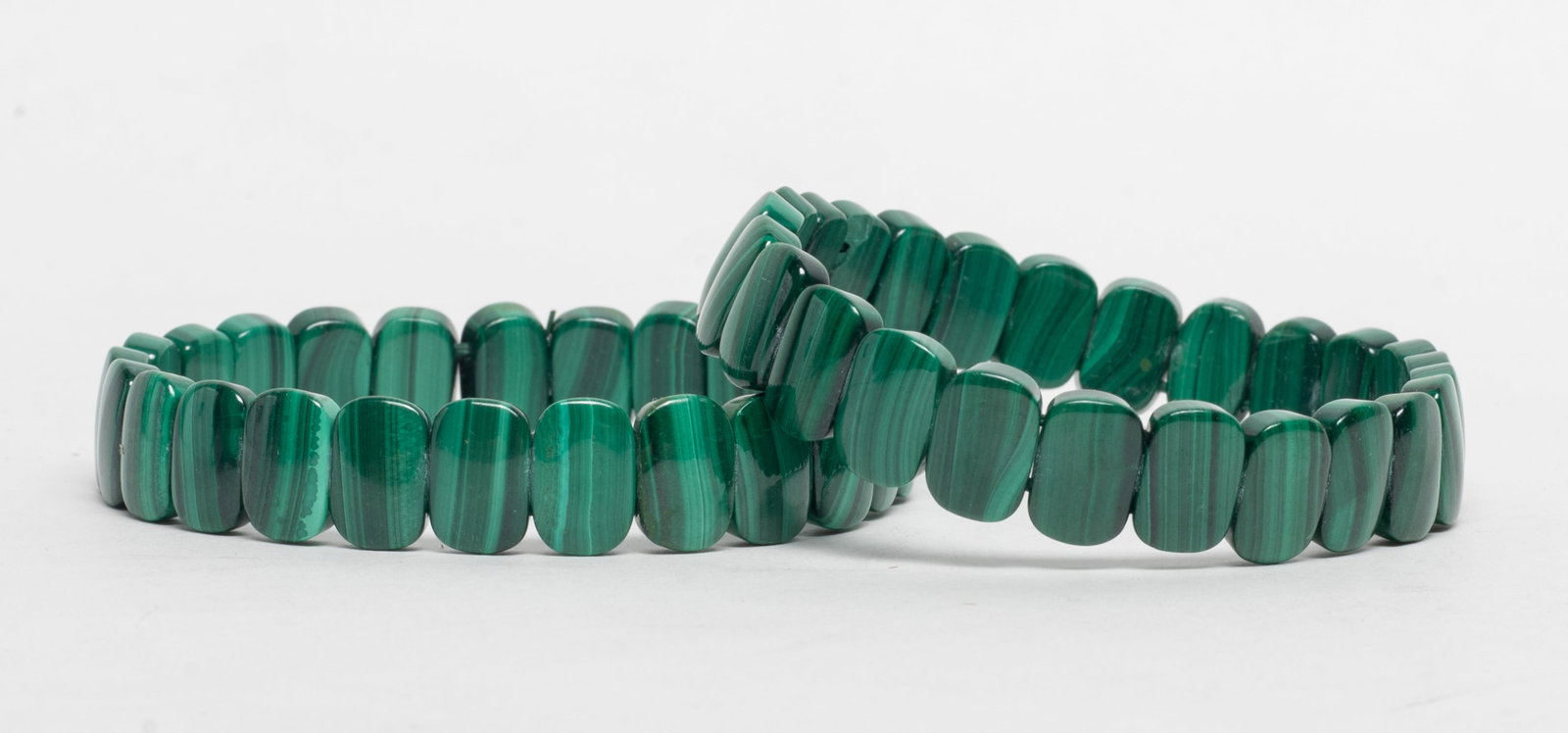 Two Vintage Designed Malachite Bracelets: Two designed malachite bracelets. Approx. 0.45*0.28 inch (each bead size).