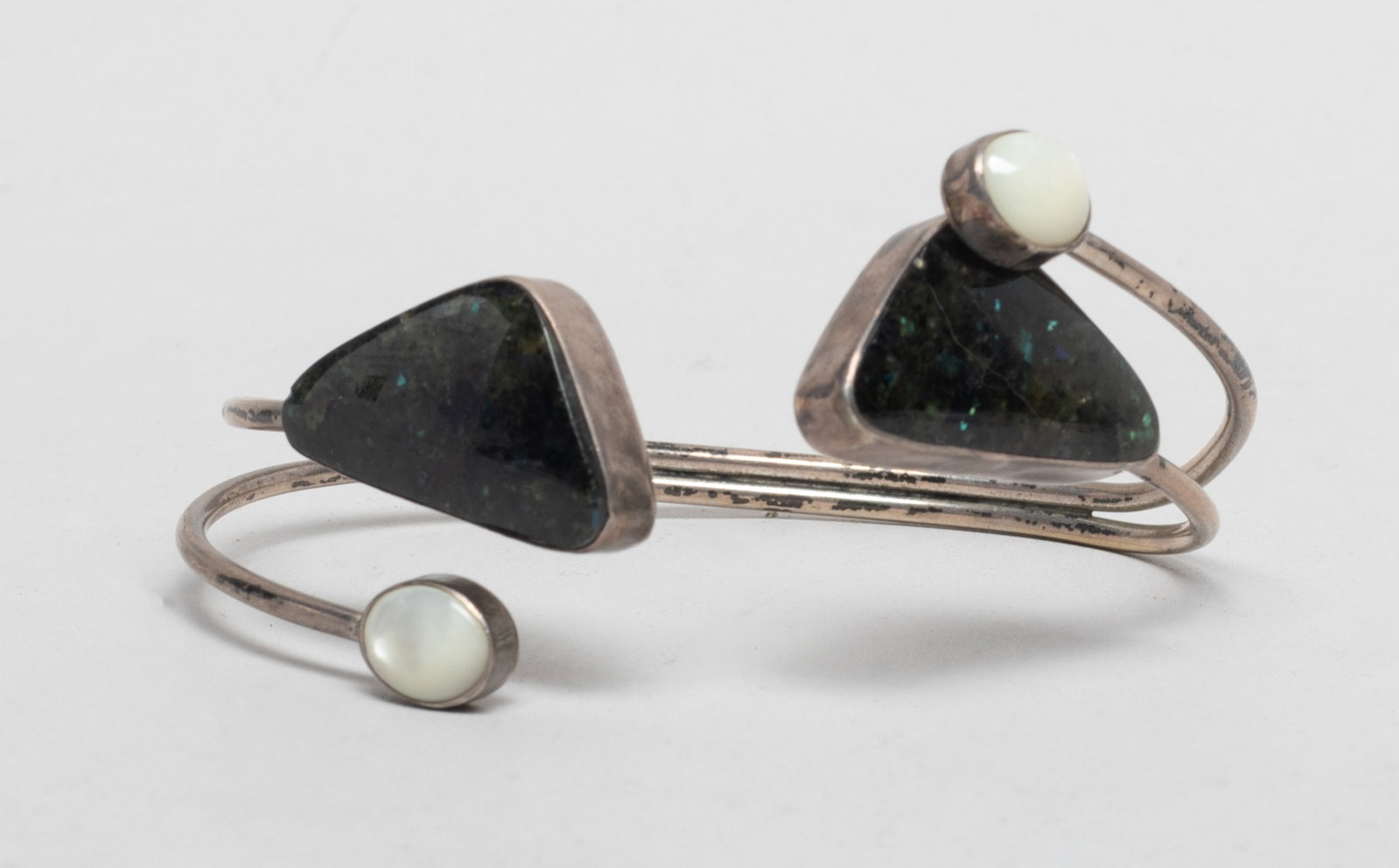 Heavy Vintage Sterling Silver, Gemstone Bracelet: Designed sterling silver bracelet inlaid gemstone, marked STERLING. Approx. 20 gram (total weight), 2.37 inch width.