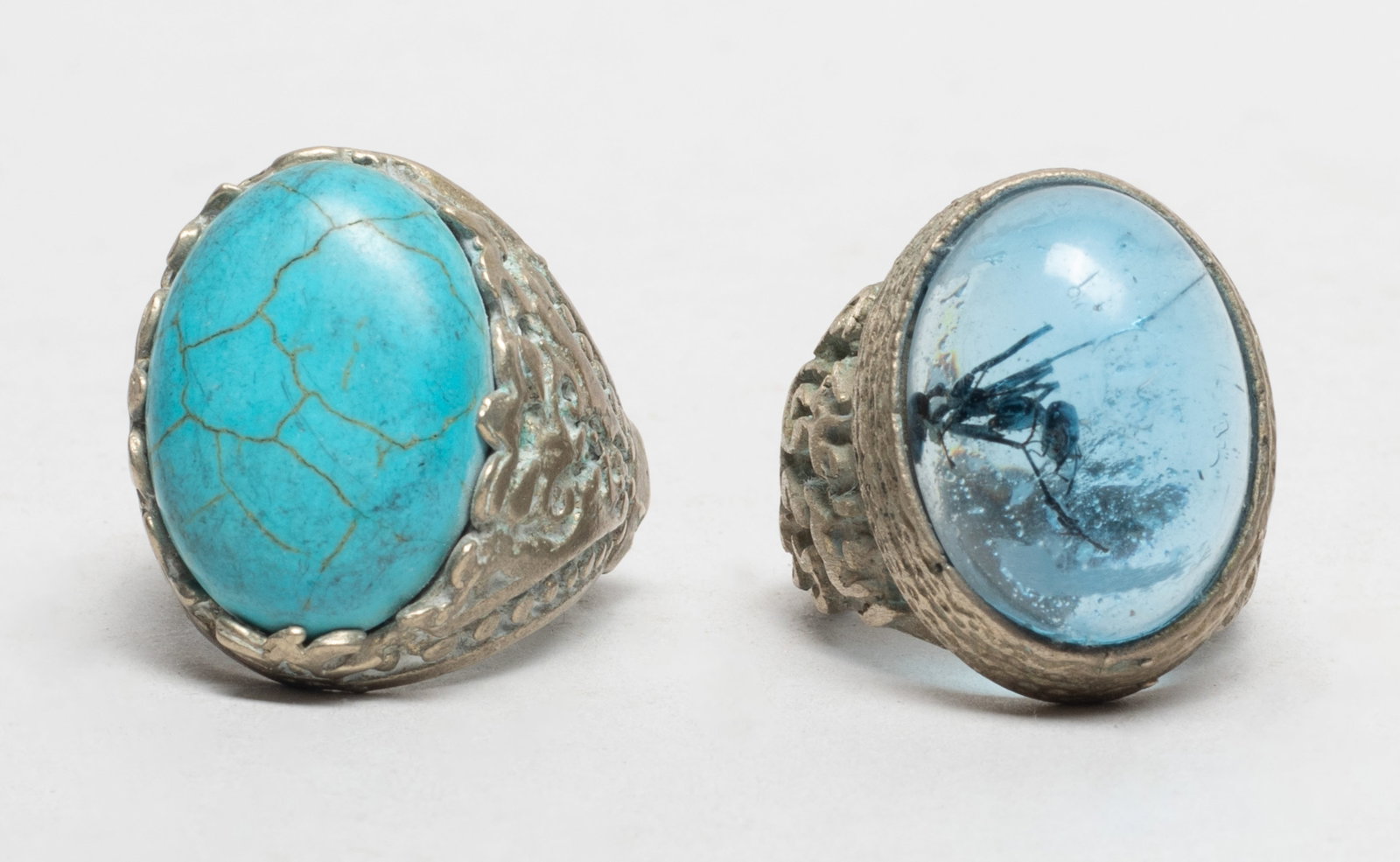 Chunk Size Old West Asian Rings, Ant Inside: Two West Asian style chunky rings, one inlaid stone, one with ant inside. US size: 10 (each).