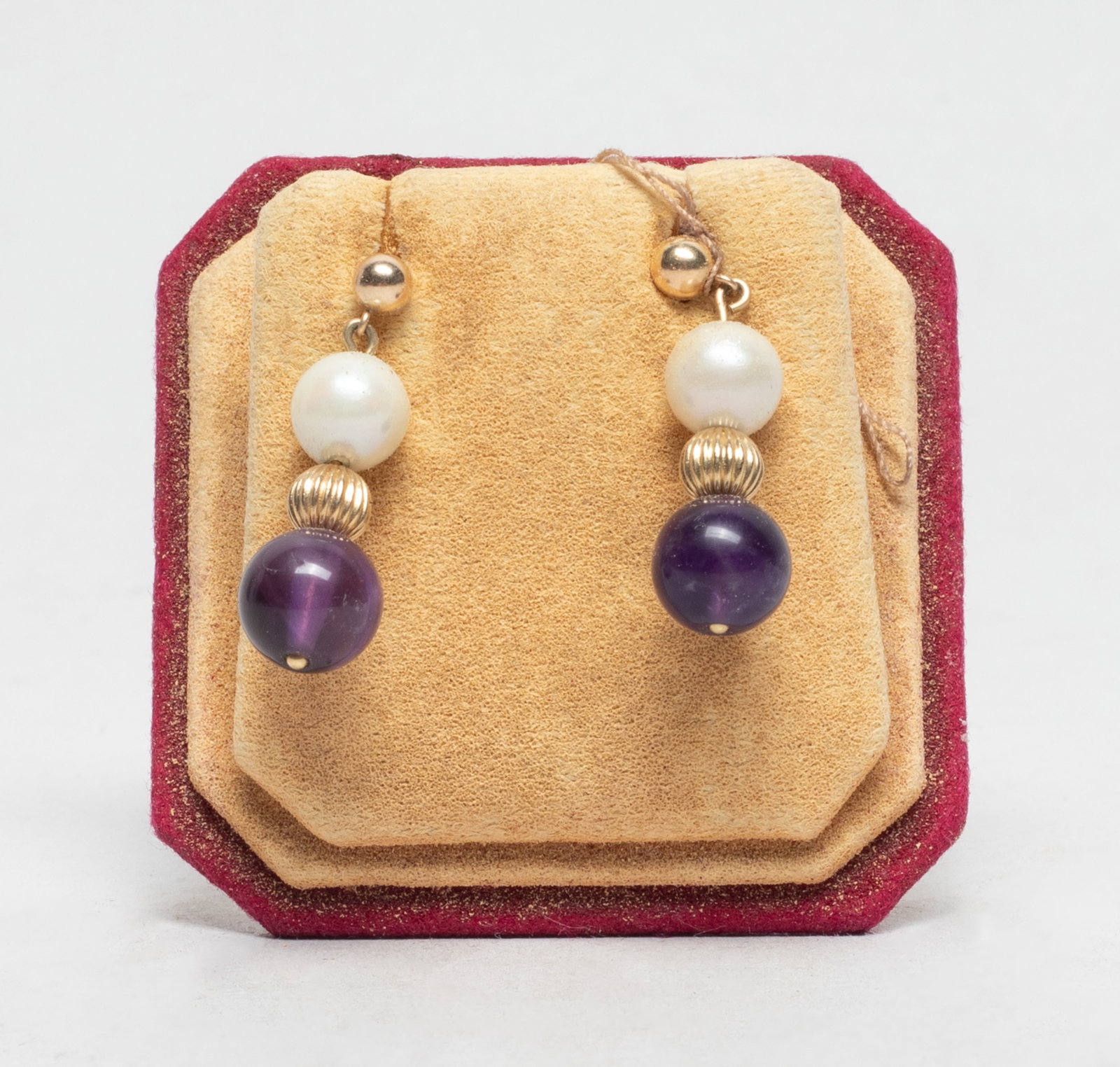 Vtg. Chinese 14K Gold, Amethyst, Pearl Earrings: A pair of Chinese marked 14K gold earrings with pearl and amethyst beads. Approx. 3.3 gram (total earring weight).