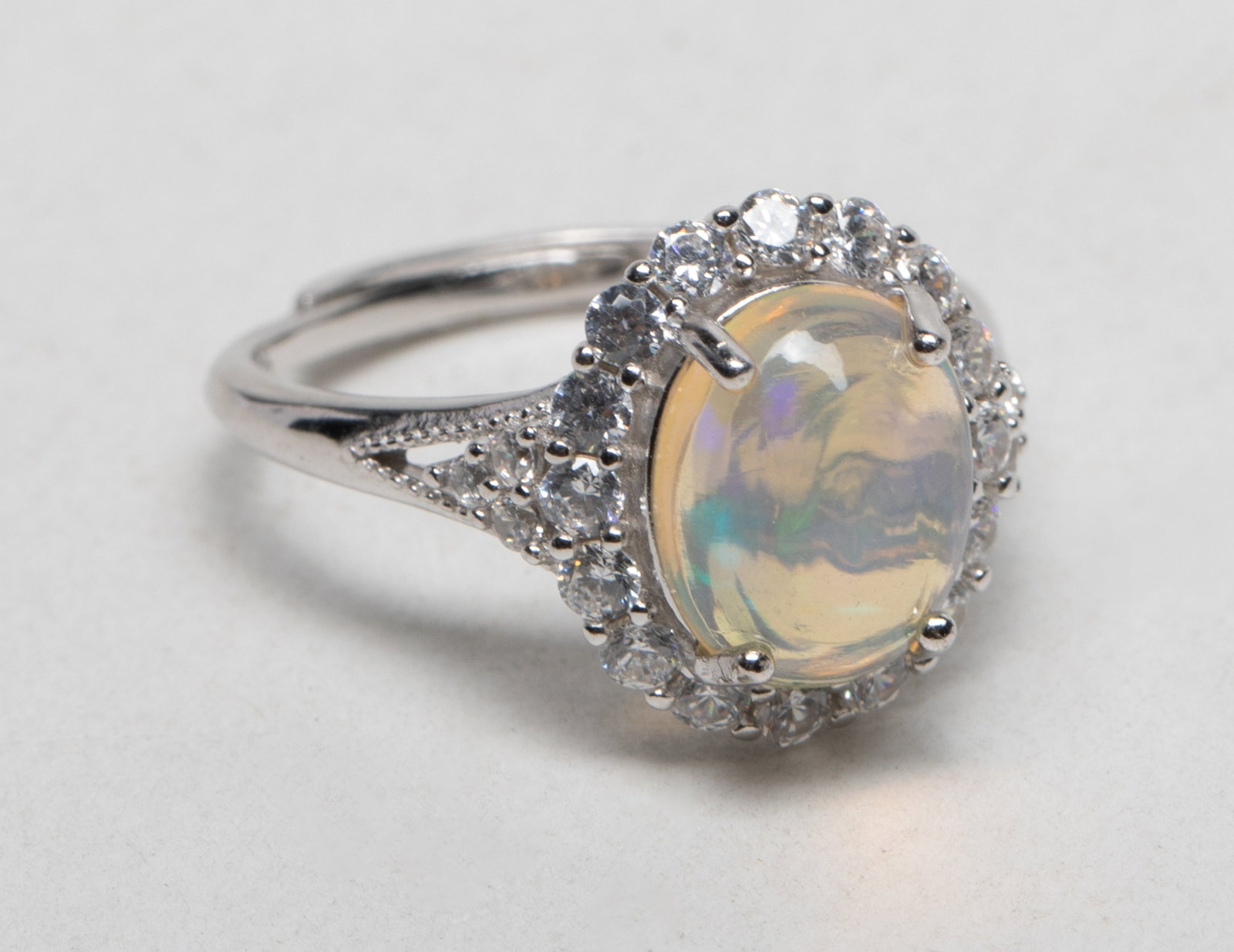 Vintage Fire Opal Ring: Vintage ring inlaid with large fire opal stone, marked S925. US size: 6.5. Approx. 3 gram.