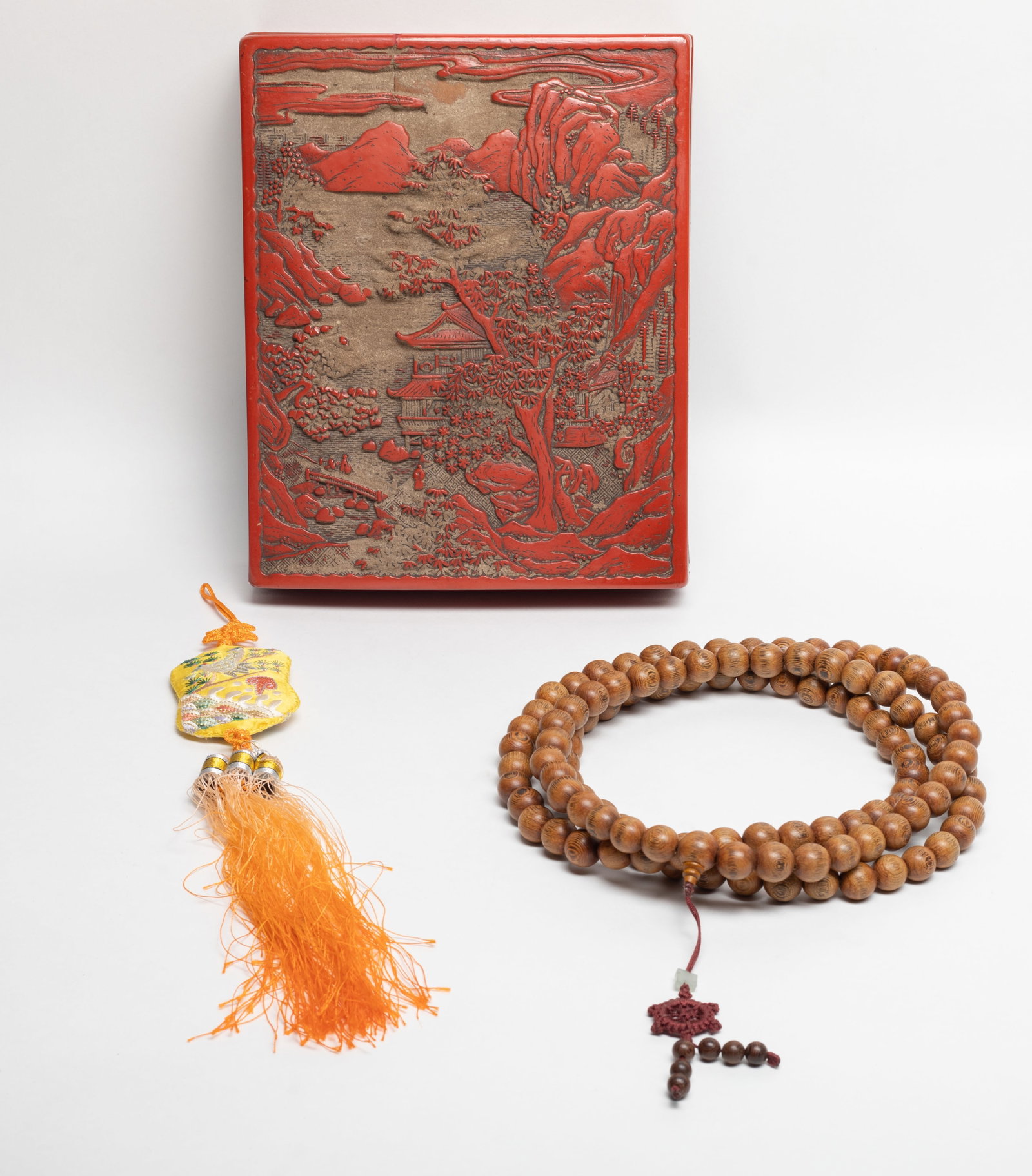 Chinese Wood Prayer Beads, Silk, Lg Box: A long string of Chinese wood prayer beads, a silk sachet with tassel, and a box carved landscape. Approx. 9.5*7.7*2.3 inch (box size).