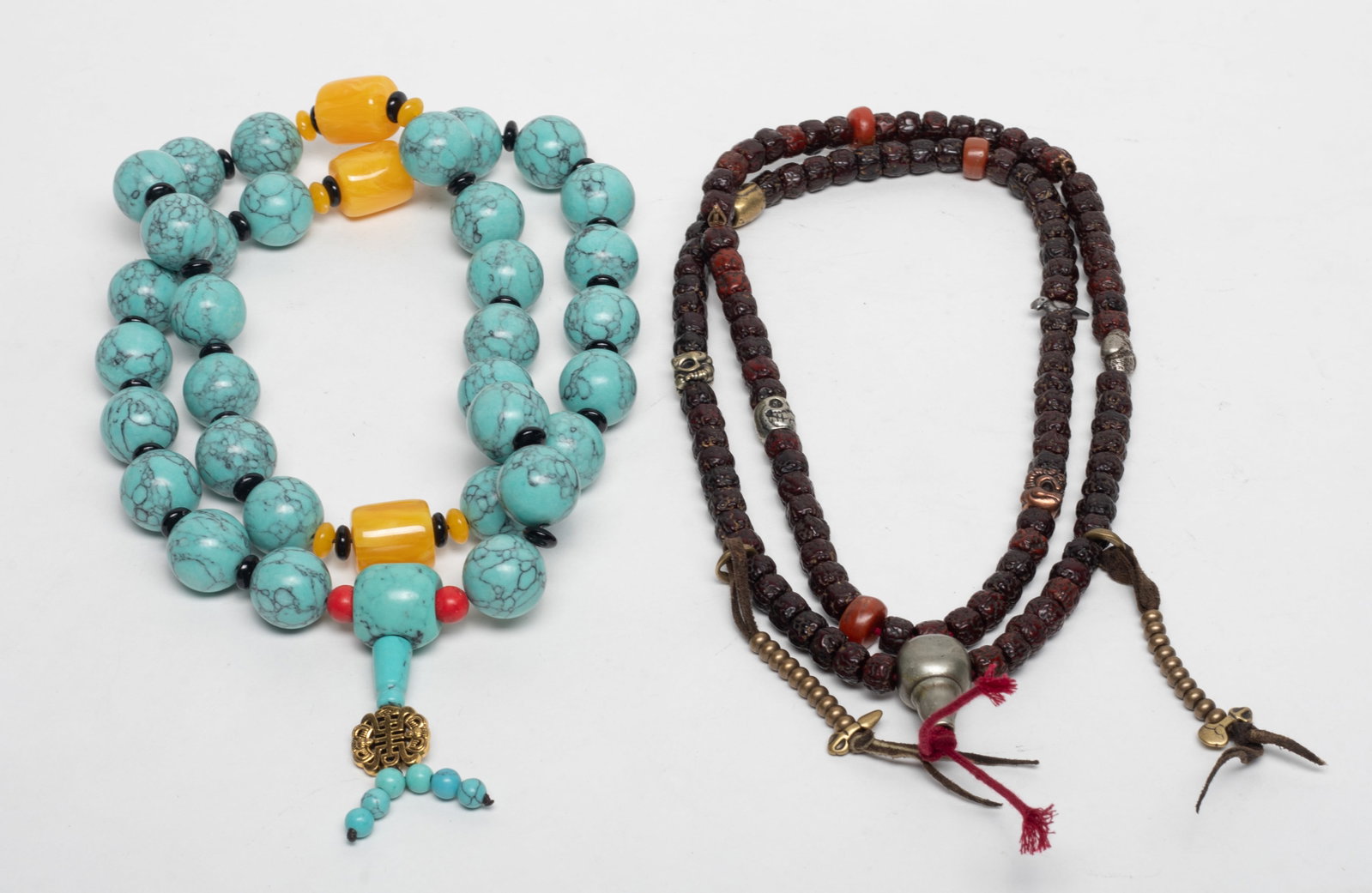 Estate Chinese Stone, Seed Prayer Beads: Two strings of Chinese stone and seed prayer beads, with decor pendants. Approx. 32 inch L (longer).