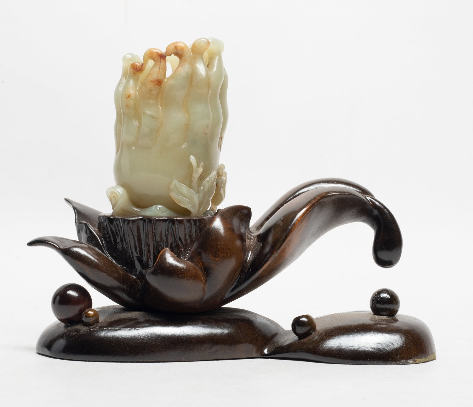Chinese Russet Jade Buddha Hand Vase: Chinese russet jade vase naturalistically carved of buddha hand citron form, with flower form wood stand. Approx. 3.7*2.2*1.9 inch (jade size).