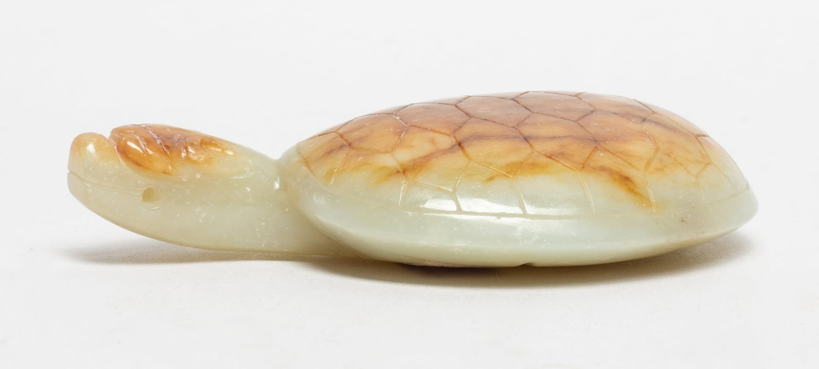 Chinese Russet Jade Pendant: Large Chinese russet jade pendant carved of tortoise form. Approx. 3.63*1.95*0.75 inch.