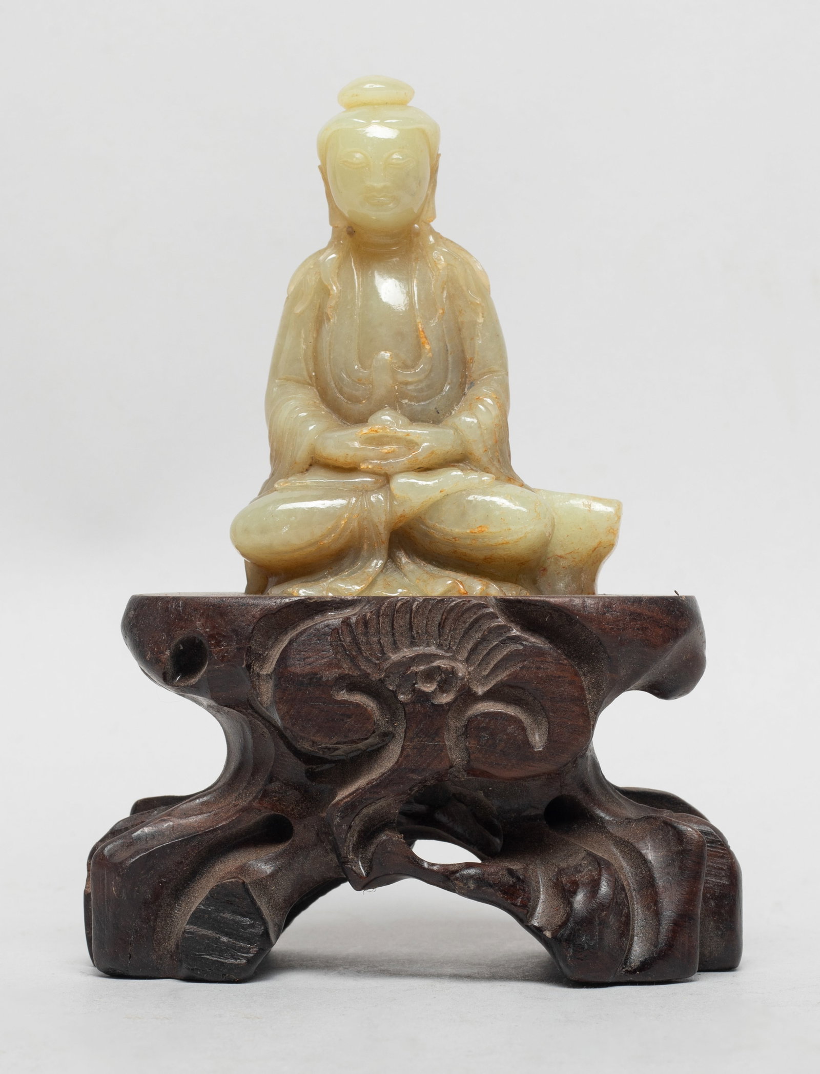 Chinese Ming Type Russet Jade Buddha: Chinese russet jade carved seated Buddha sculpture, affixed to a tall wood stand. Approx. 5.1*3.7*1.7 inch (w/ stand).