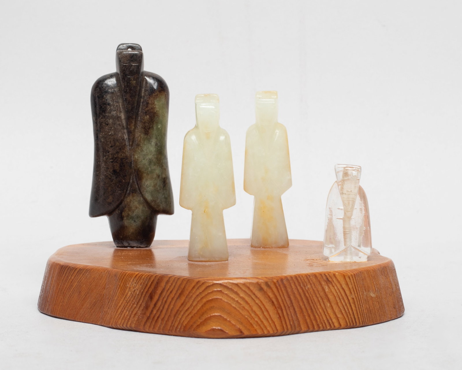 Chinese Jade, Crystal Figures Set: Three Chinese jade carved figures and a crystal figure, with wood base. Approx. 4.3*4*3.07 inch (w/ base).
