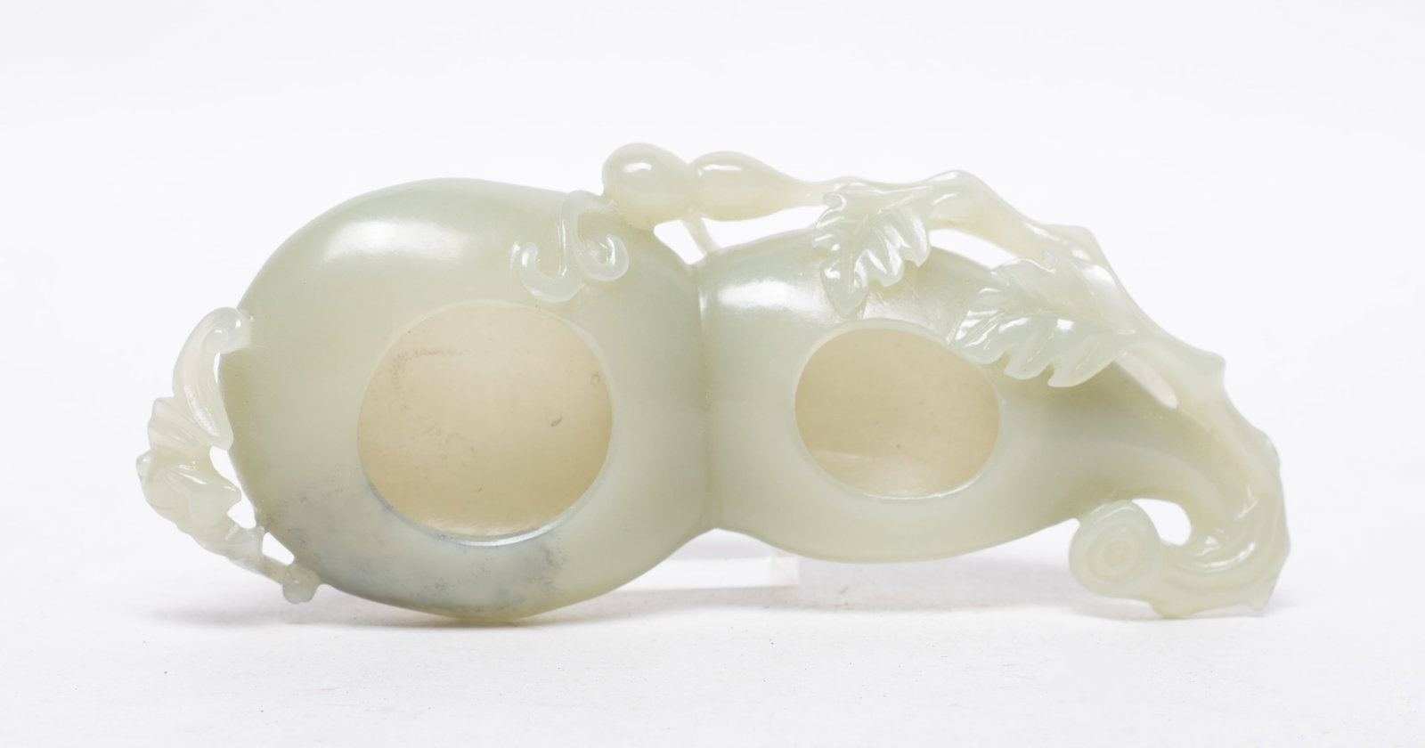 Chinese Jade Carved Gourd Form Washer: Chinese jade double gourd form washer, carved in high relief with bat and smaller gourds. Approx. 5.07*2.04*0.9 inch.