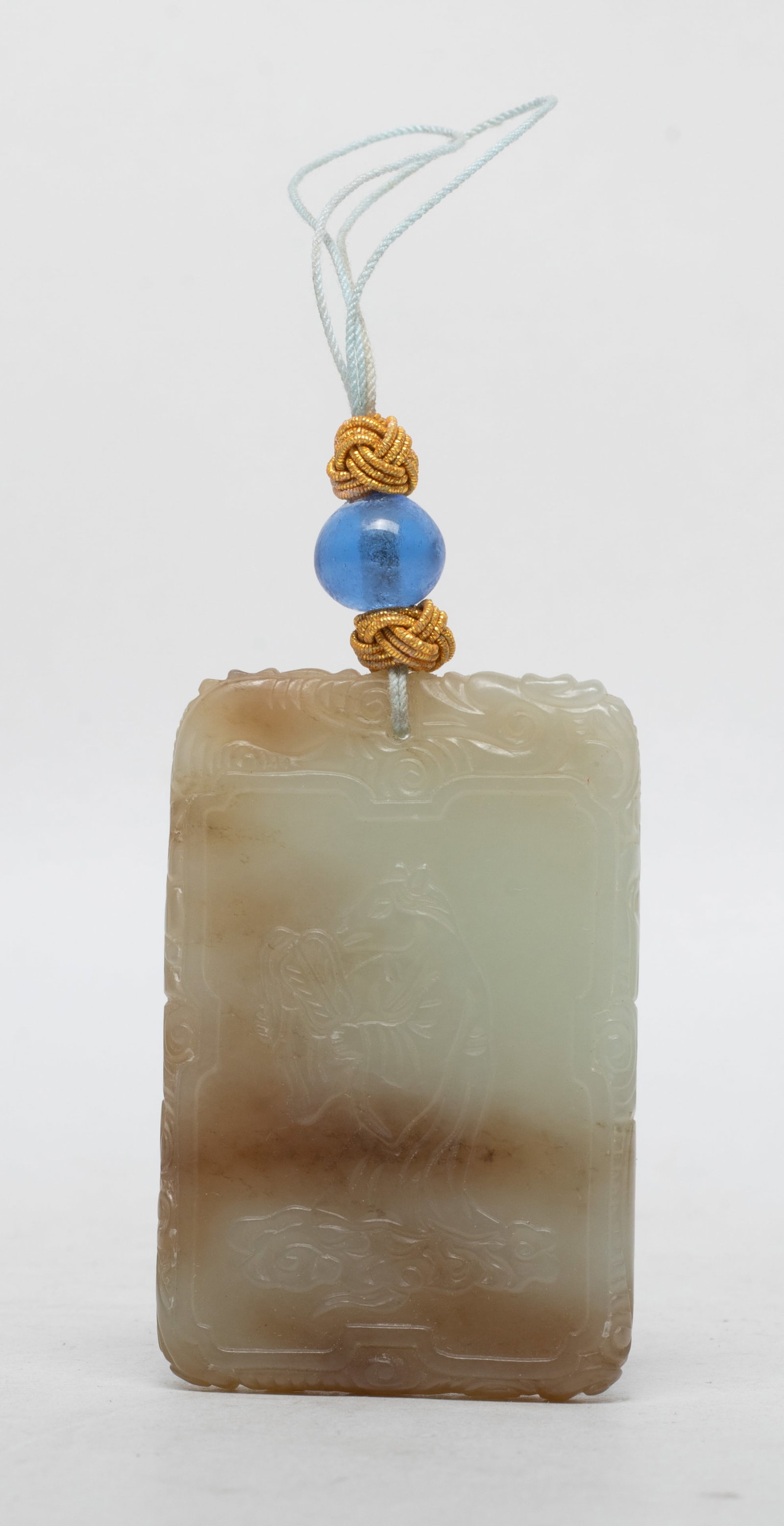 Chinese Jade Carved Plaque w/ Peiking Glass Bead: Chinese russet jade plaque, one side carved a horse-head figure, reverse side carved beast and seal mark, with a blue Peiking glass bead. Approx. 1.54*2.33 inch.