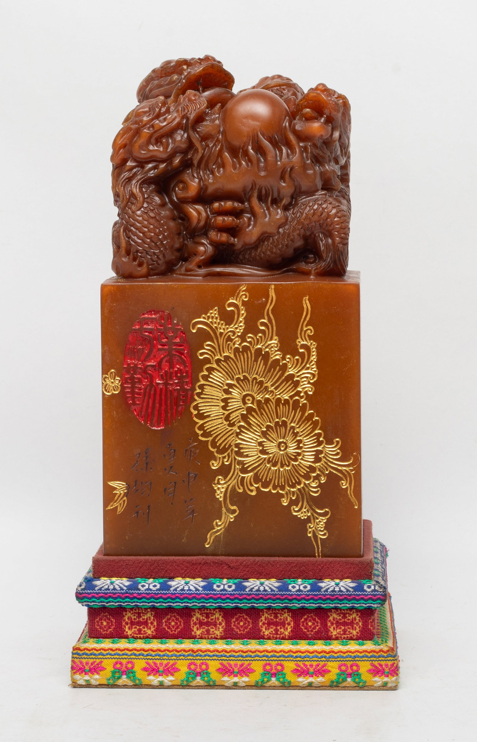 Large & Heavy Chinese Shoushan Stone Seal: Large heavy Chinese Shoushan stone seal carved with coiled dragons on the top, the sides incised flowers and mark, with stand. Approx. 7.8*3.9*3.9 inch (w/o stand).
