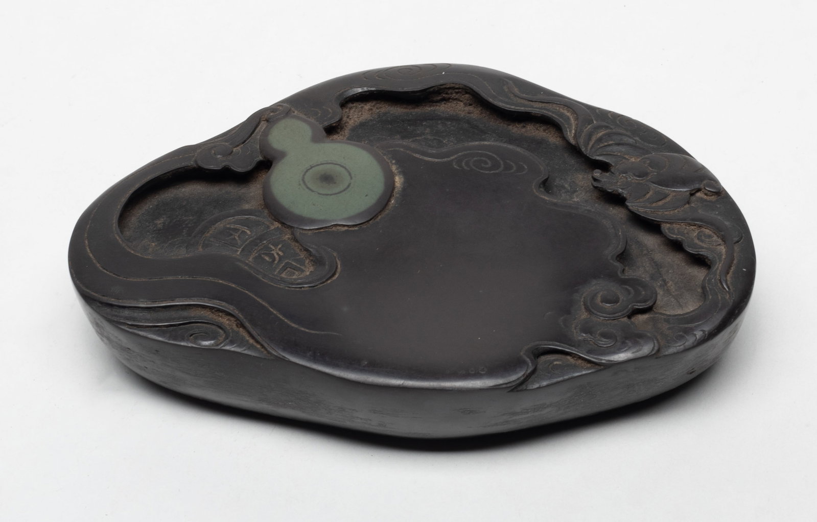 Chinese Duan Stone Carved Ink Stone: Chinese Duan ink stone carved with gourd and bat, with inscription to underside. Approx. 5.9*3.8*1.2 inch.