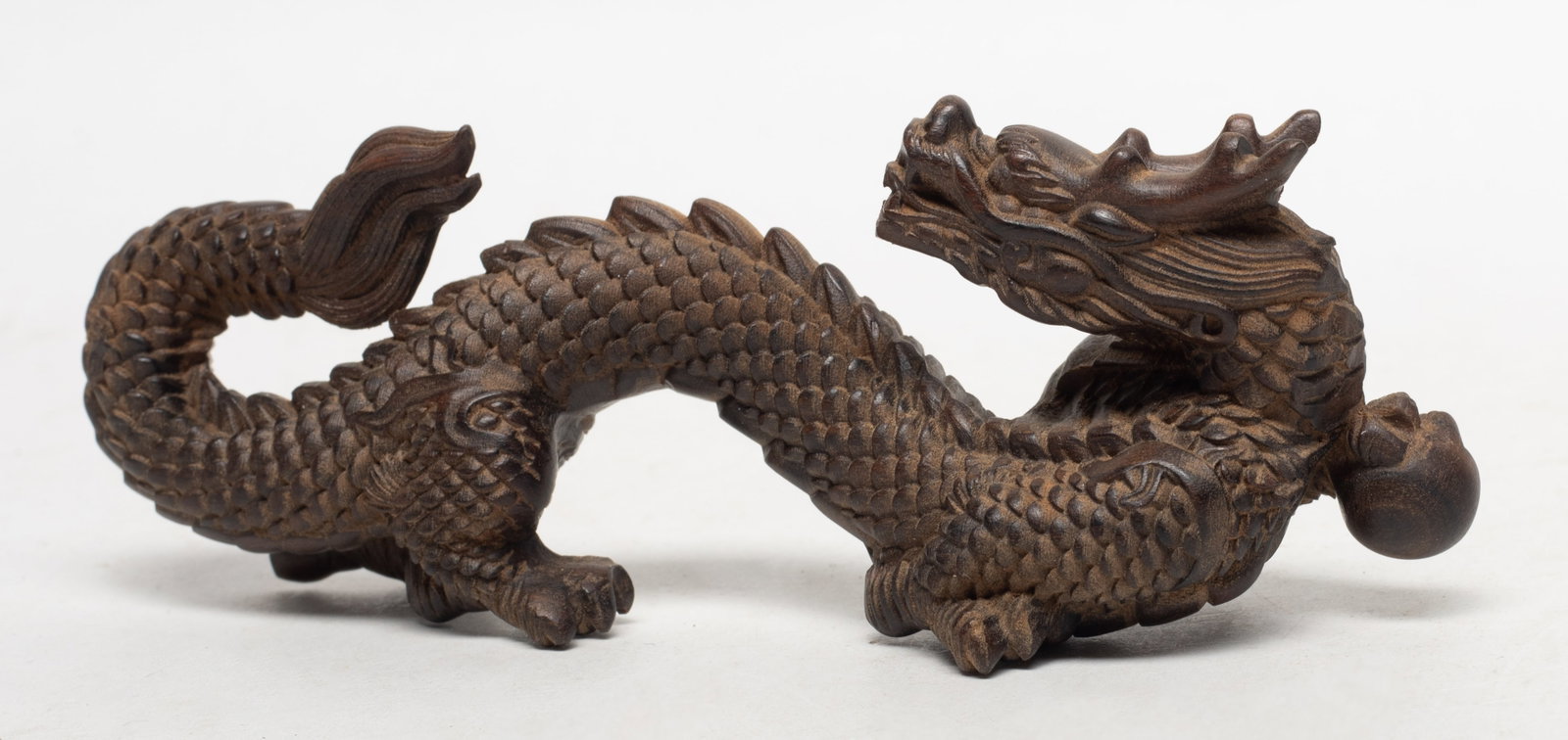 Vtg. Chinese Agarwood Dragon Brush Stand: Chinese agarwood carved dragon brush stand. Approx. 61 gram, 5.55*2*1.4 inch.