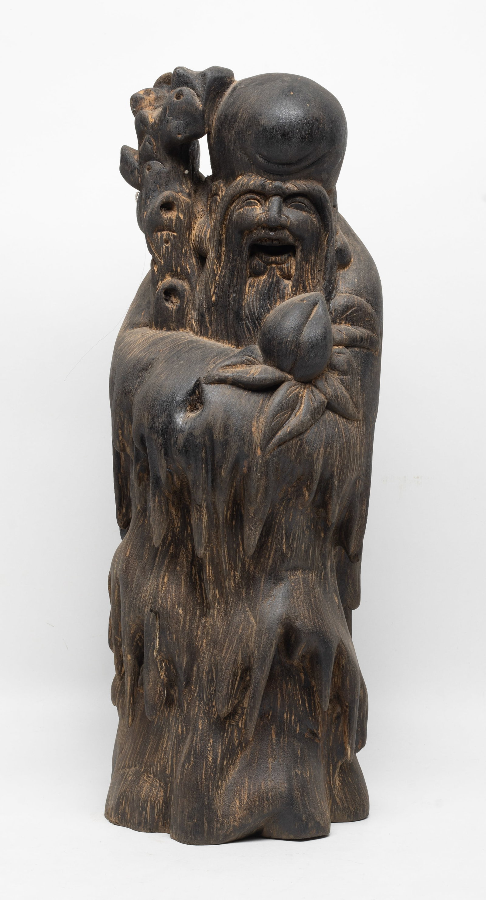 Tall Chinese Early Export Agarwood Shoulao: Tall Chinese agaroowd sculpture carved as Shoulao holding a peach and a walking stick with gourd. Approx. 18.2*6.3*6 inch, 2000 gram.