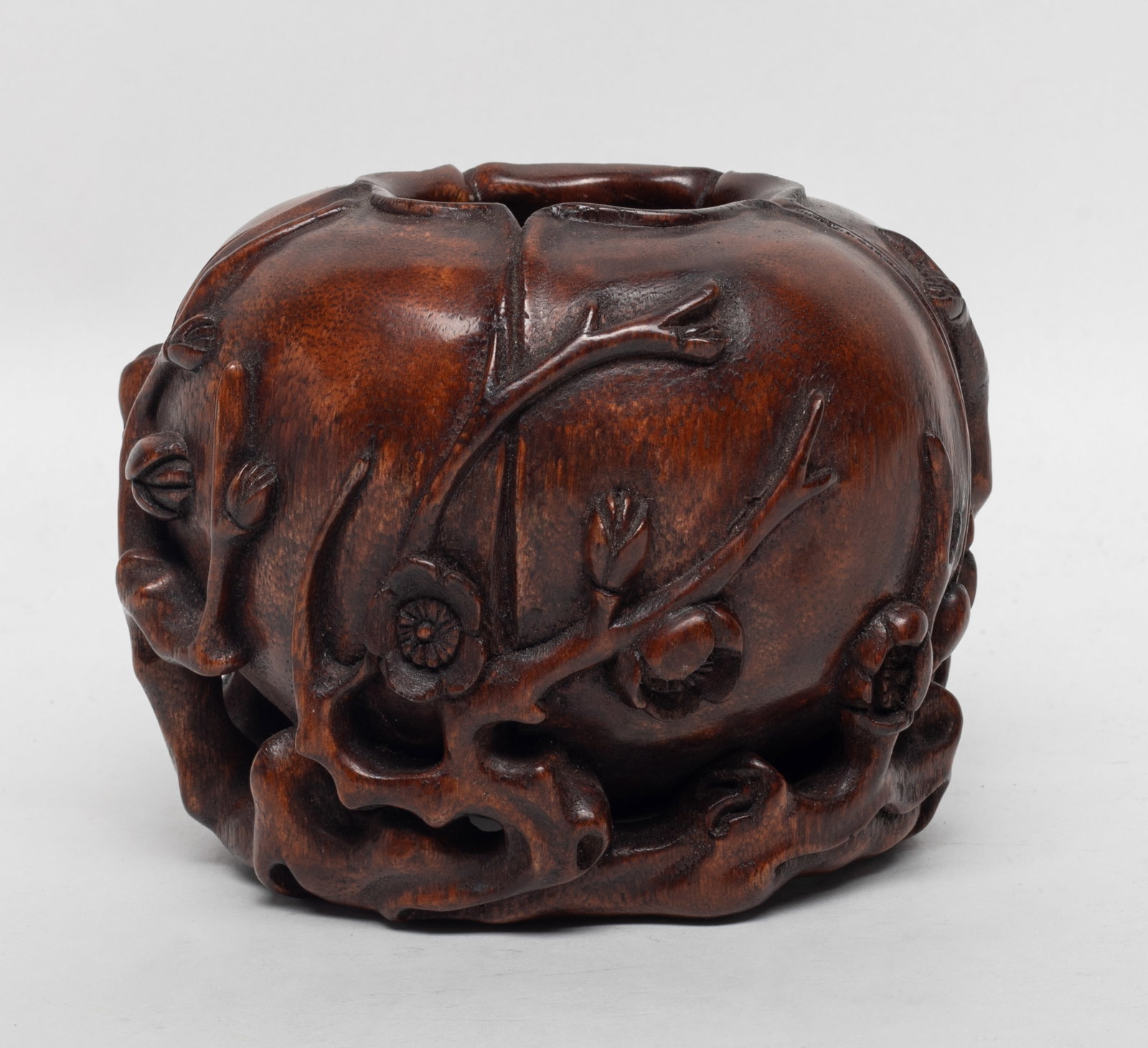 Chinese Bark of Agarwood Water Pot: Chinese bark of agarwood floral form water pot, reticulated with flower stems forming the base. Approx. 4.3*3.4*3.3 inch.