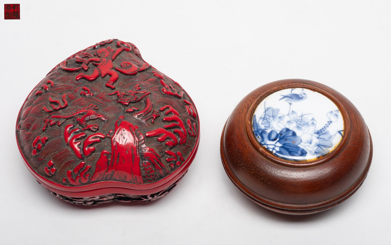 Estate Two Chinese Export Boxes: A Chinese porcelain-inlay wood box and a carved cinnabar-like box. Approx. 4.8*4.7*2.6 inch (larger).