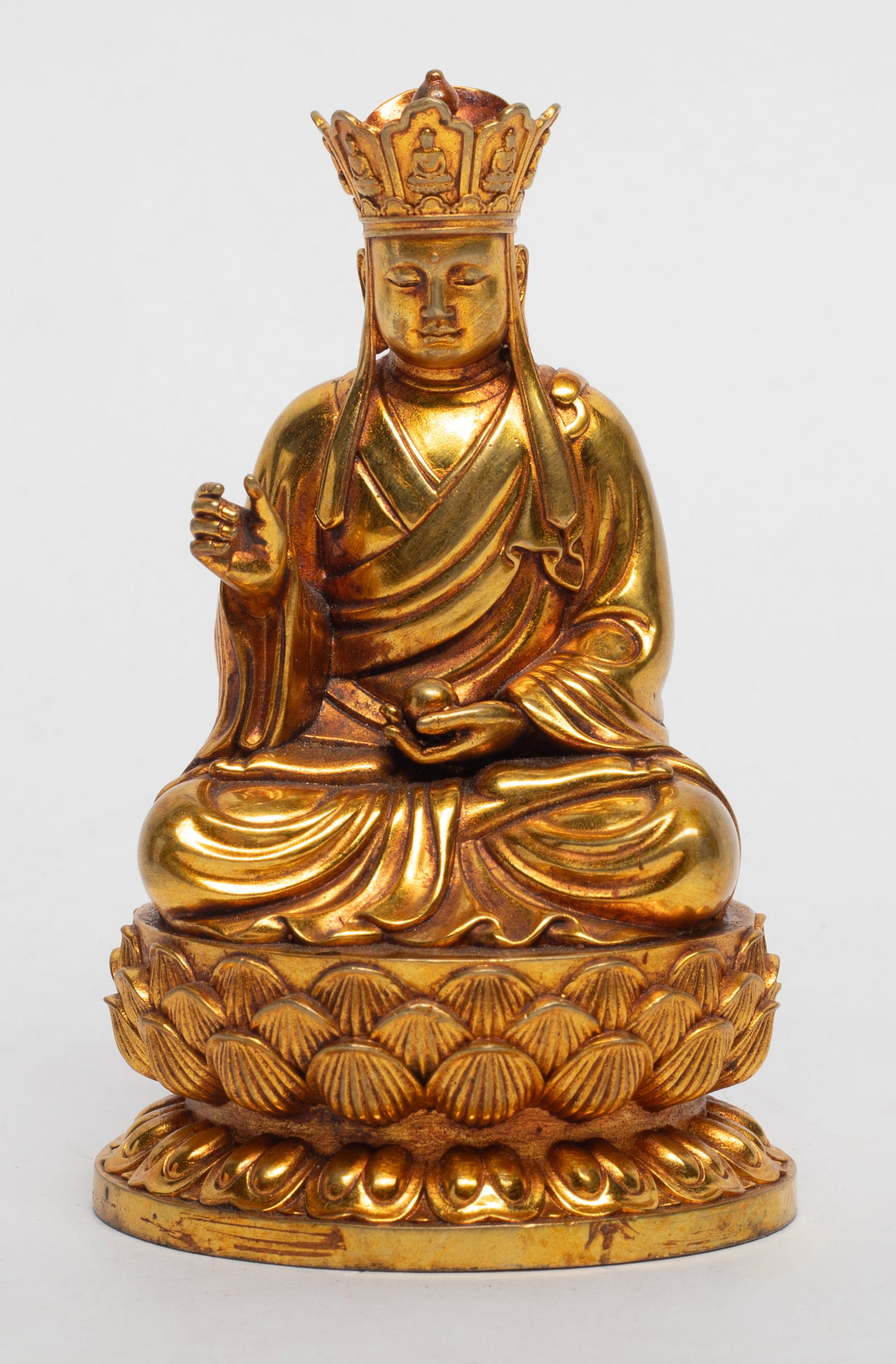 Vintage Chinese Export Gold on Bronze Buddha: A Chinese gilt bronze sculpture of seated Buddha. Approx. 3.5*2.2*1.9 inch.