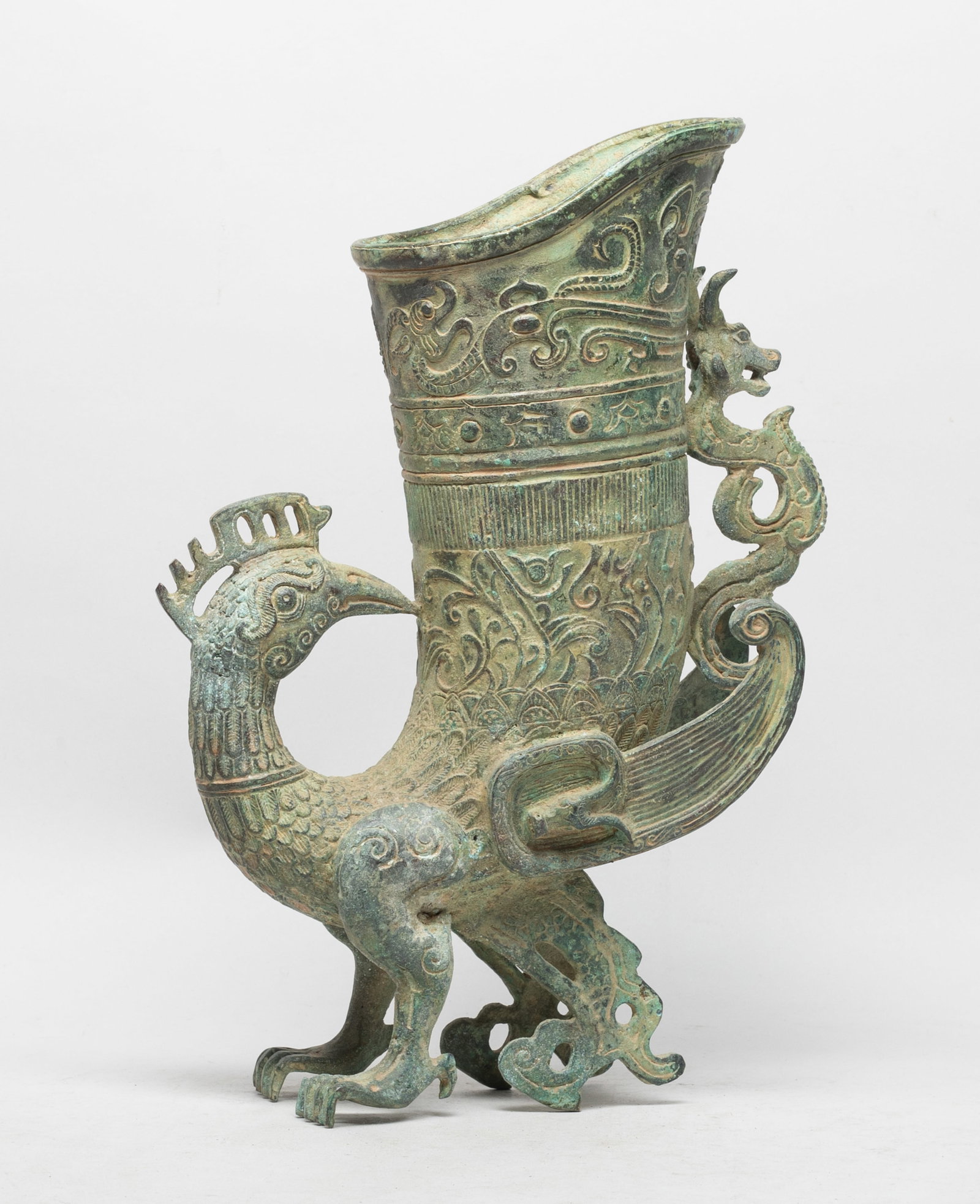 Tall Chinese Bronze Bird Vase: Chinese bronze vast mythical bird form vase, with a scrolling beast handle. Approx. 11.7*8*3 inch.