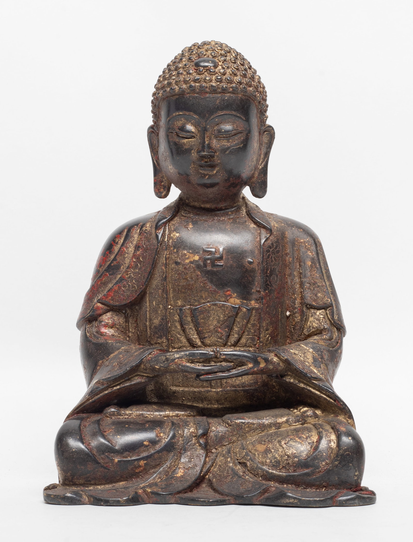 Chinese Gilt Bronze Buddha Sculpture: Chinese gilt bronze seated Buddha sculpture, the hands in dhyana mudra. Approx. 7.1*5*3.2 inch.