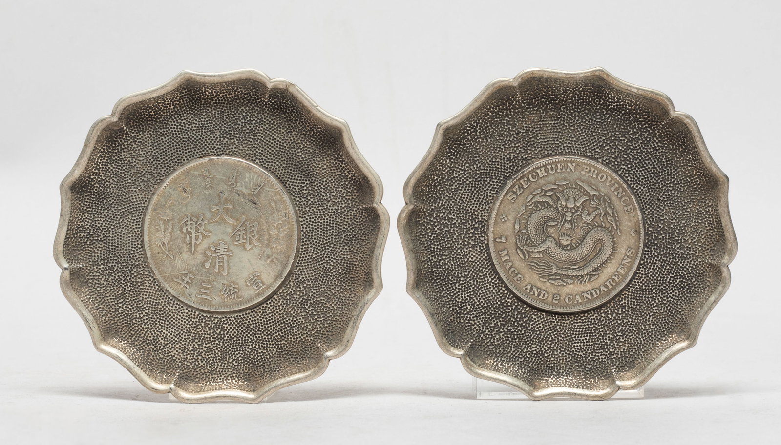Two Chinese Export Dishes: Two Chinese dishes of floral shape. Approx. 3.4 inch D (each).
