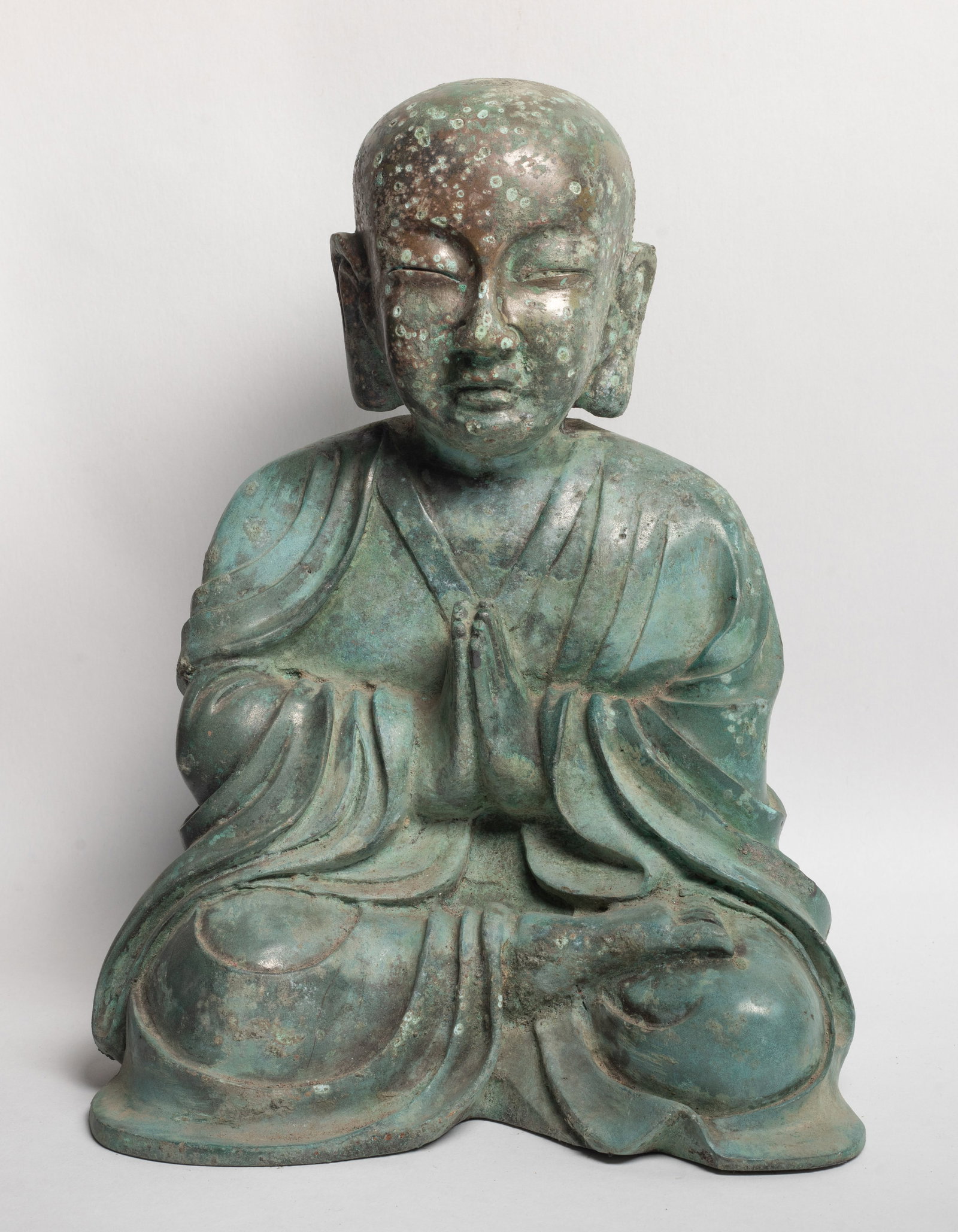 Large Chinese Bronze Temple Used Buddha: Large hollow Chinese bronze cast Buddha sculpture, the hands in namaskara mudra. Approx. 11*8.3*6 inch.