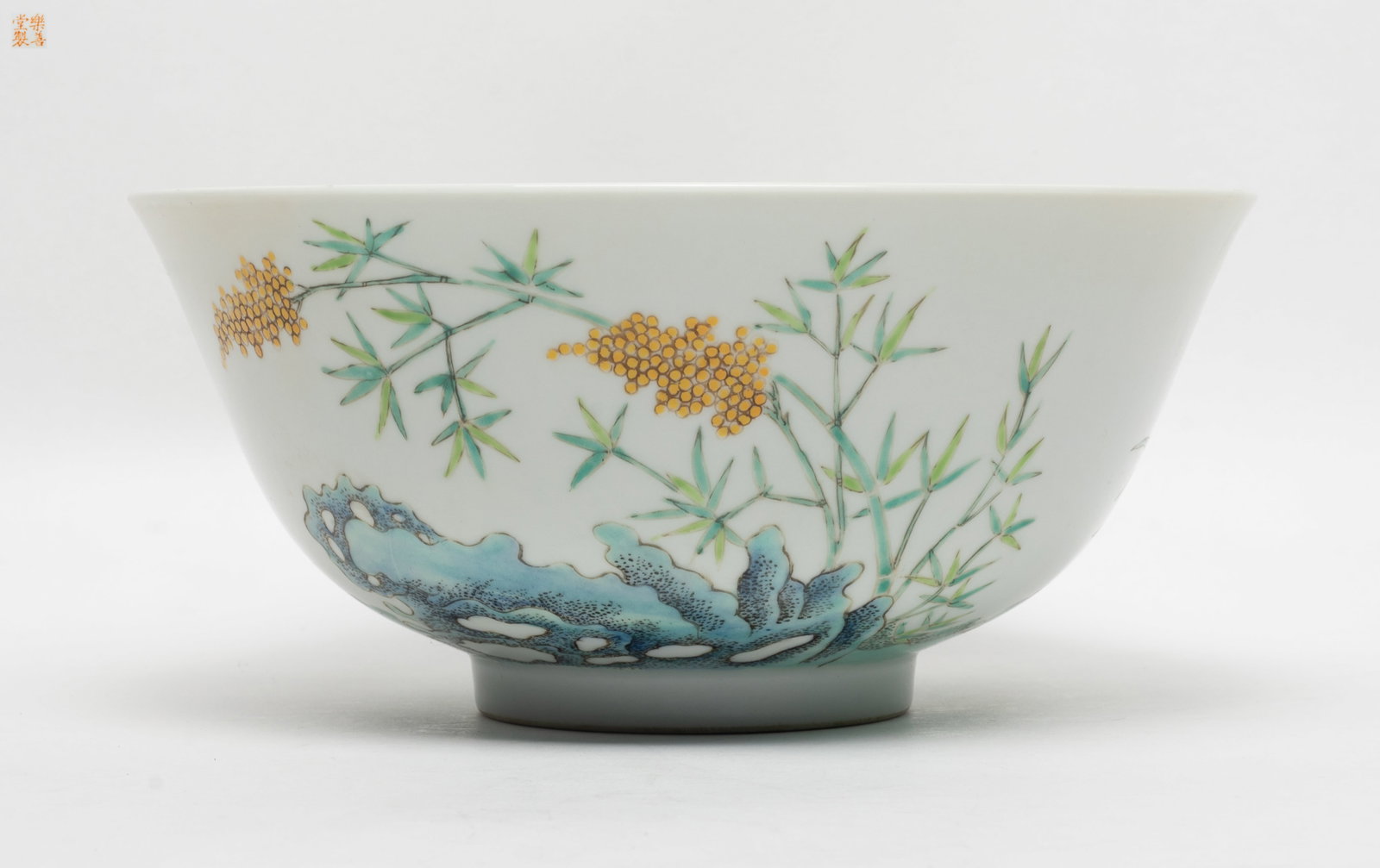 Large Chinese Famille Rose Porcelain Bowl: Large Chinese famille rose porcelain bowl, enameled and painted with bamboo, orchid and lingzhi, marked four characters to underside. Approx. 7.8*3.6 inch.