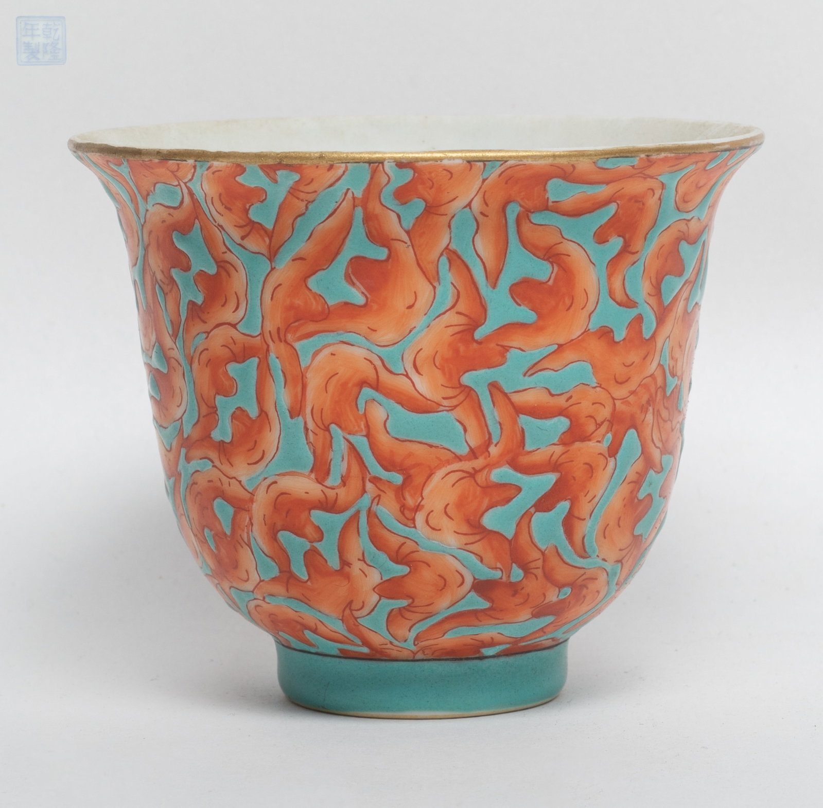 Estate Chinese Famille Rose Porcelain Tea Cup: Chinese famille rose porcelain tea cup enameled with copper red bats on turquoise glazed body, a seal mark to underside. Approx. 3.8*2.8 inch.