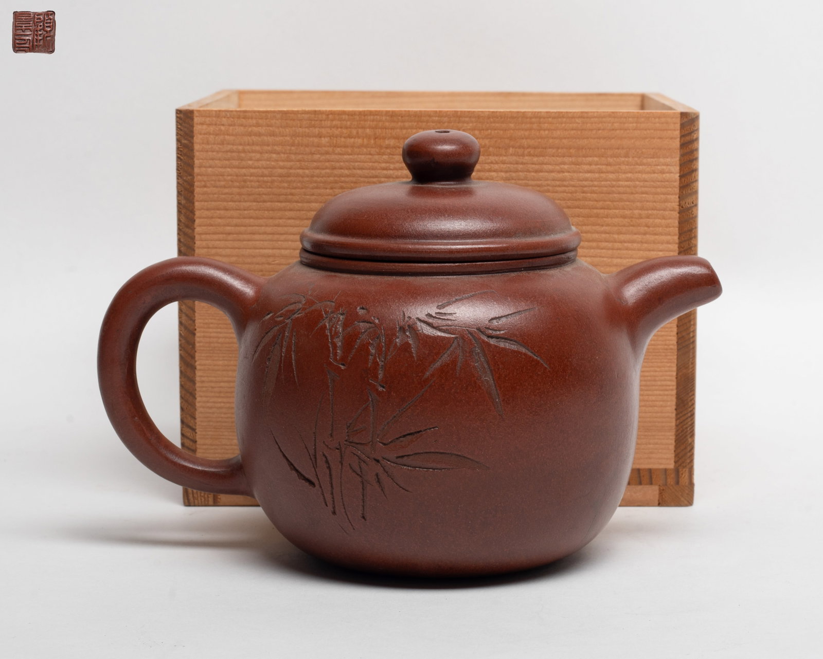 Estate Chinese Yixing Zisha Tea Pot: Chinese Yixing zisha tea pot, incised marks on lid inside and pot bottom, with lidless box. Approx. 6.2*4.1*4.4 inch.