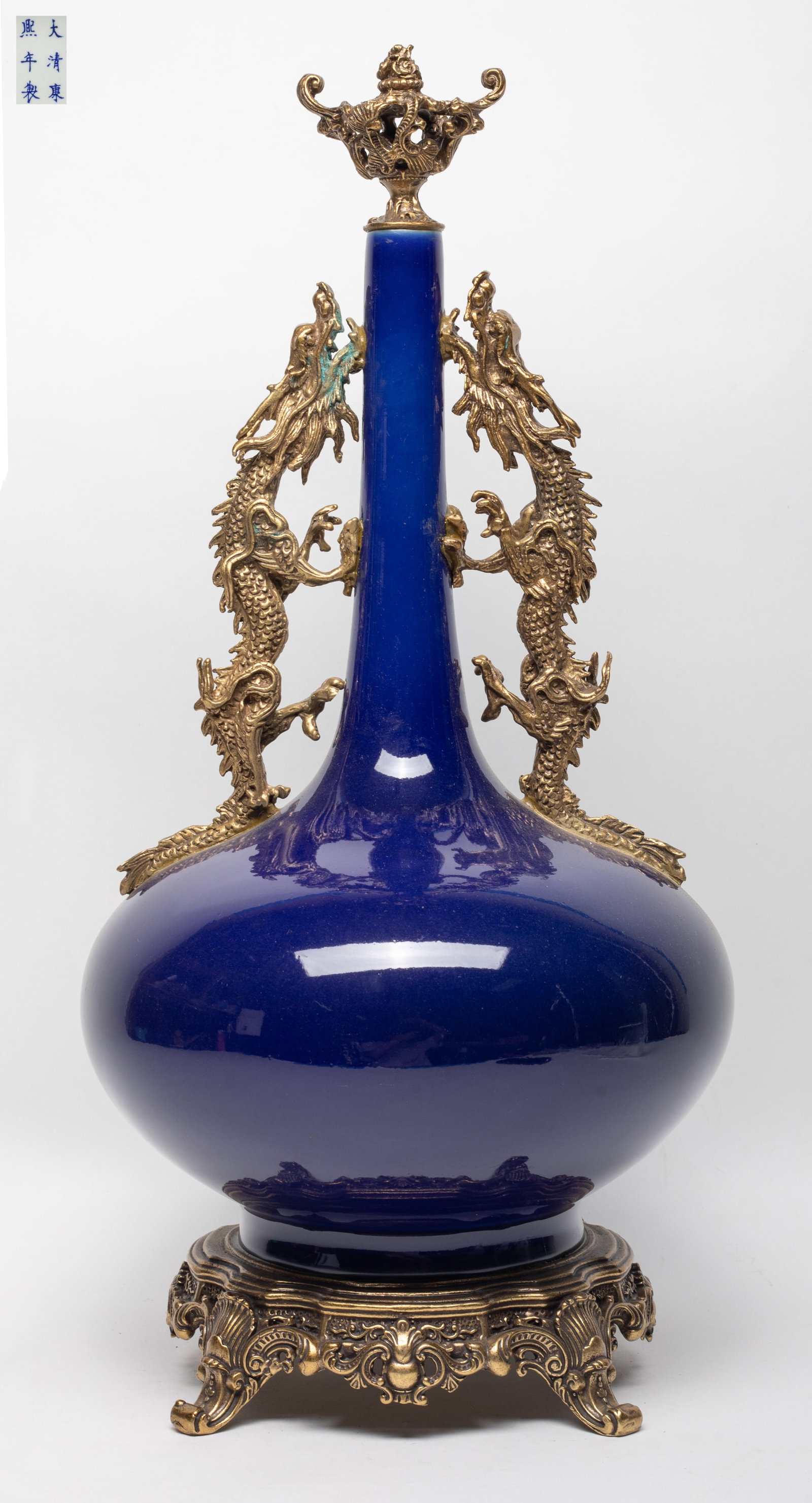 Tall Chinese Blue Glazed Porcelain Vase: Tall Chinese blue glazed porcelain vase with metal mouth, handles and base, six-character mark on the bottom. Approx. 18.7*9 inch.