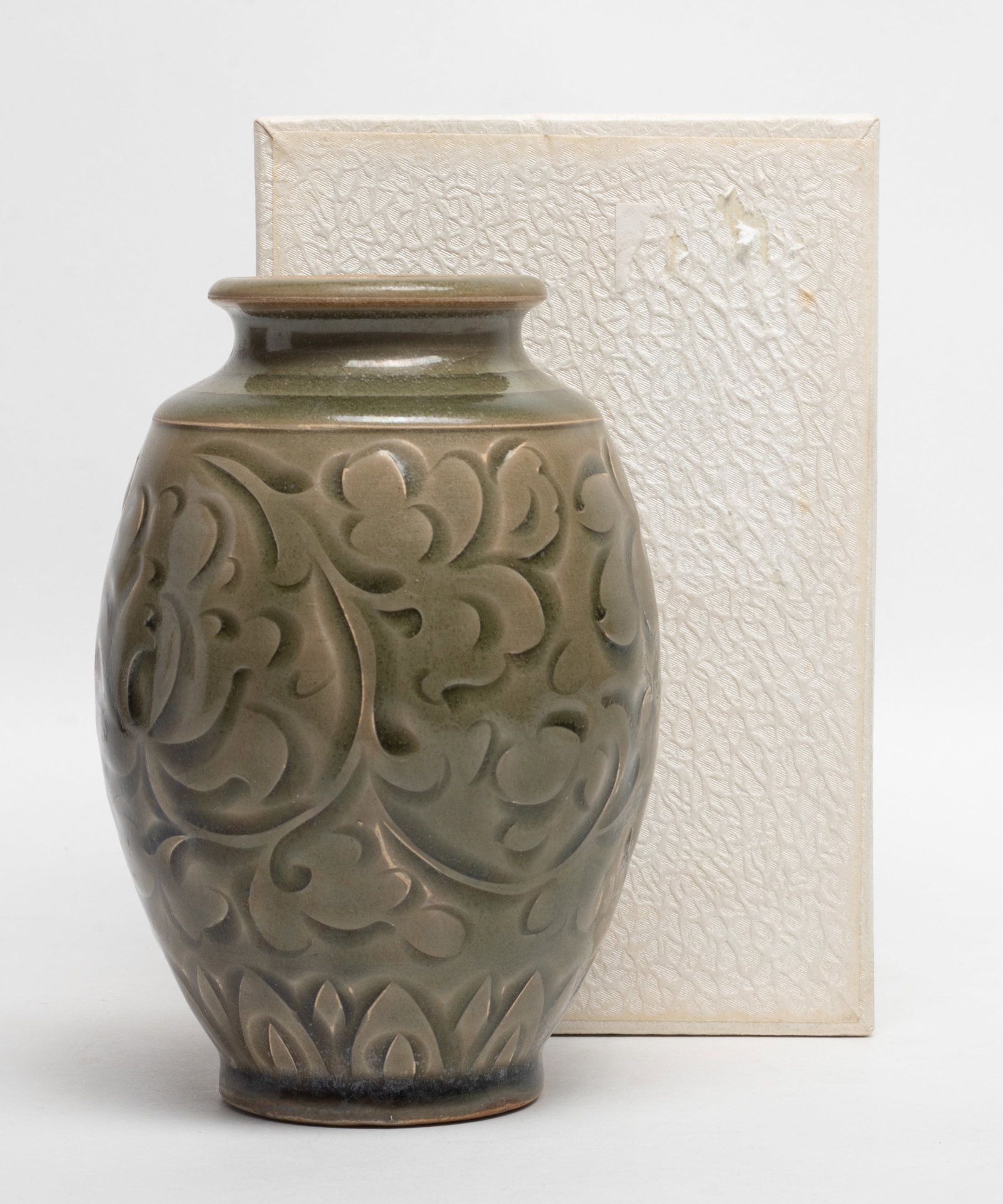Estate Chinese Yaochou Porcelain Vase: Chinese Yaozhou lotus porcelain vase, applied olive-green glaze around the exterior, with box. Approx. 3.8*5.7 inch.