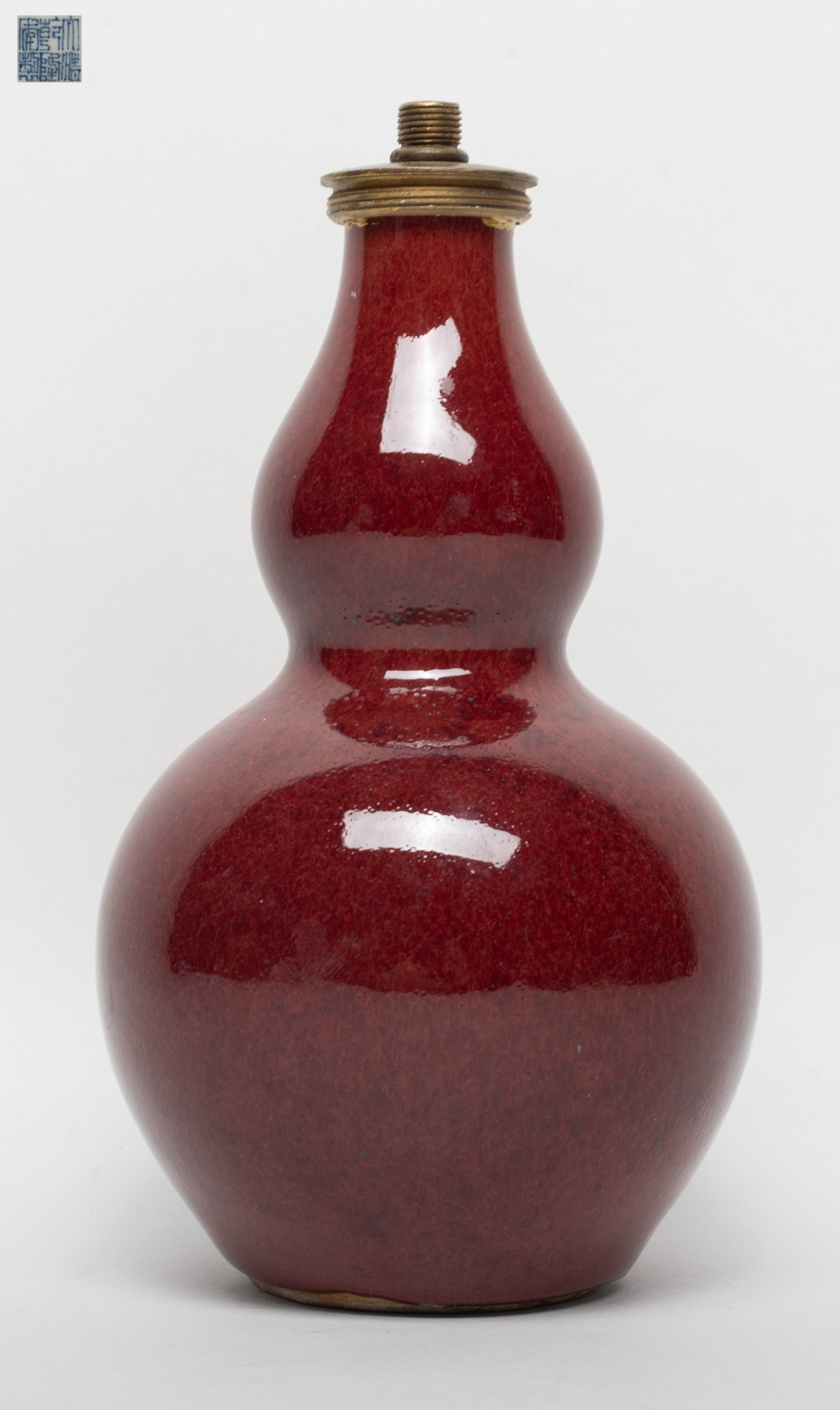 Chinese Export Red Glazed Porcelain Vase: Chinese red glazed porcelain vase, of double gourd shape, with six-character mark to the underside. Approx. 7*3.8 inch.