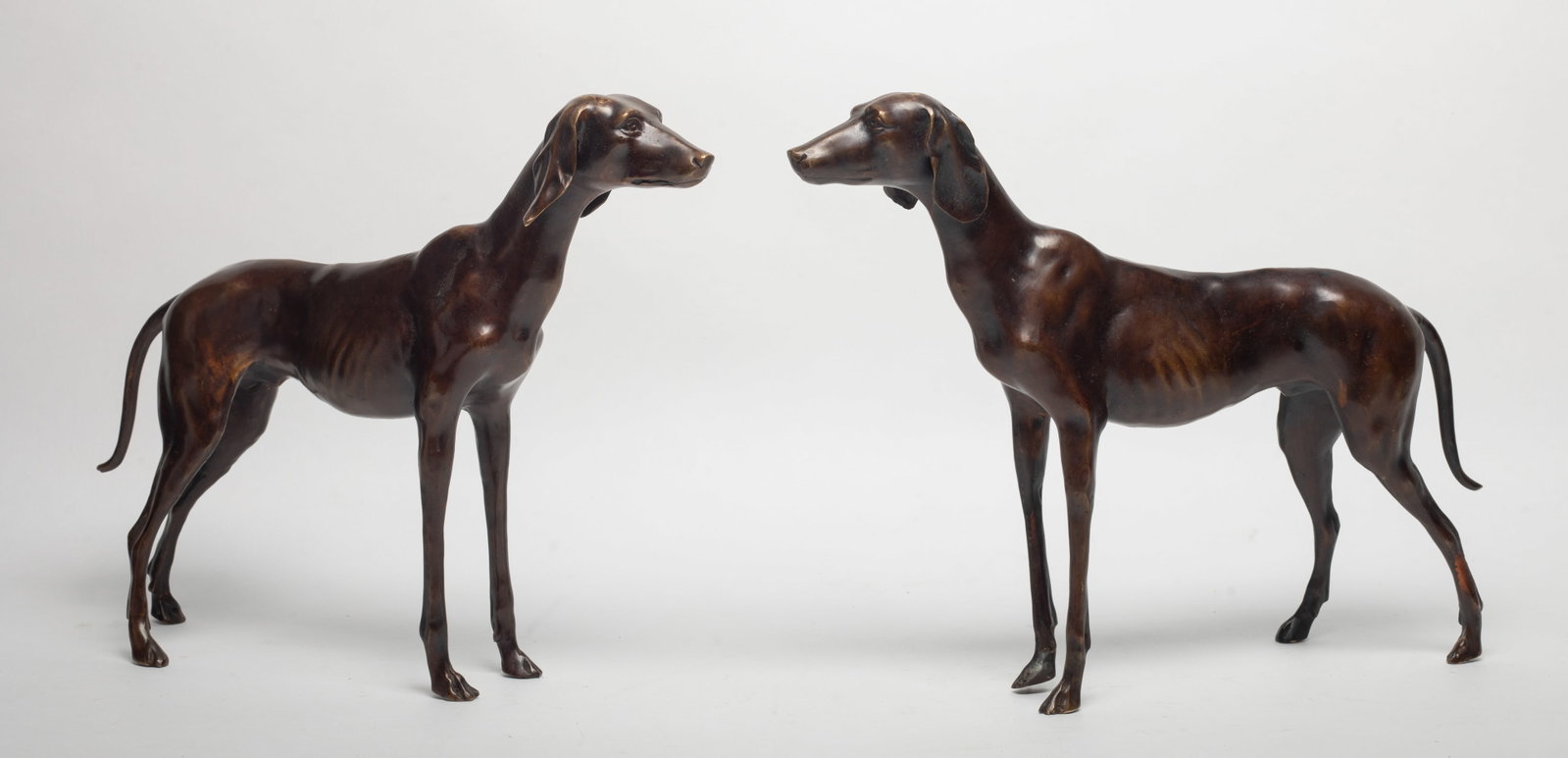 Two Vintage Art Bronze Sculptures of Dog: Two vintage bronze decor sculptures of dog form. Approx. 13*9.8*2.2 inch (each).
