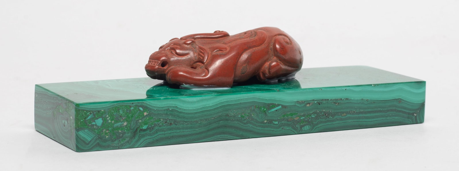 Rare Malachite Paper Weight w/ Jasper Beast: Malachite paper weight with a jasper beast sculpture. 4.77*1.48*1.24 inch.