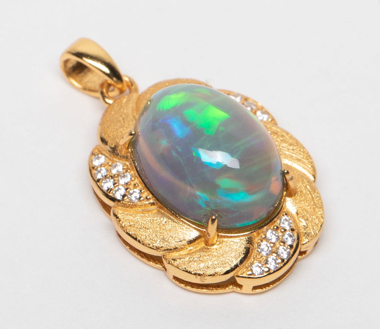 Rare Fire Opal, Stone Pendant: Designed pendant marked S925, inlaid fire opal stone. Approx. 2.64 gram, 0.87*0.63 inch.