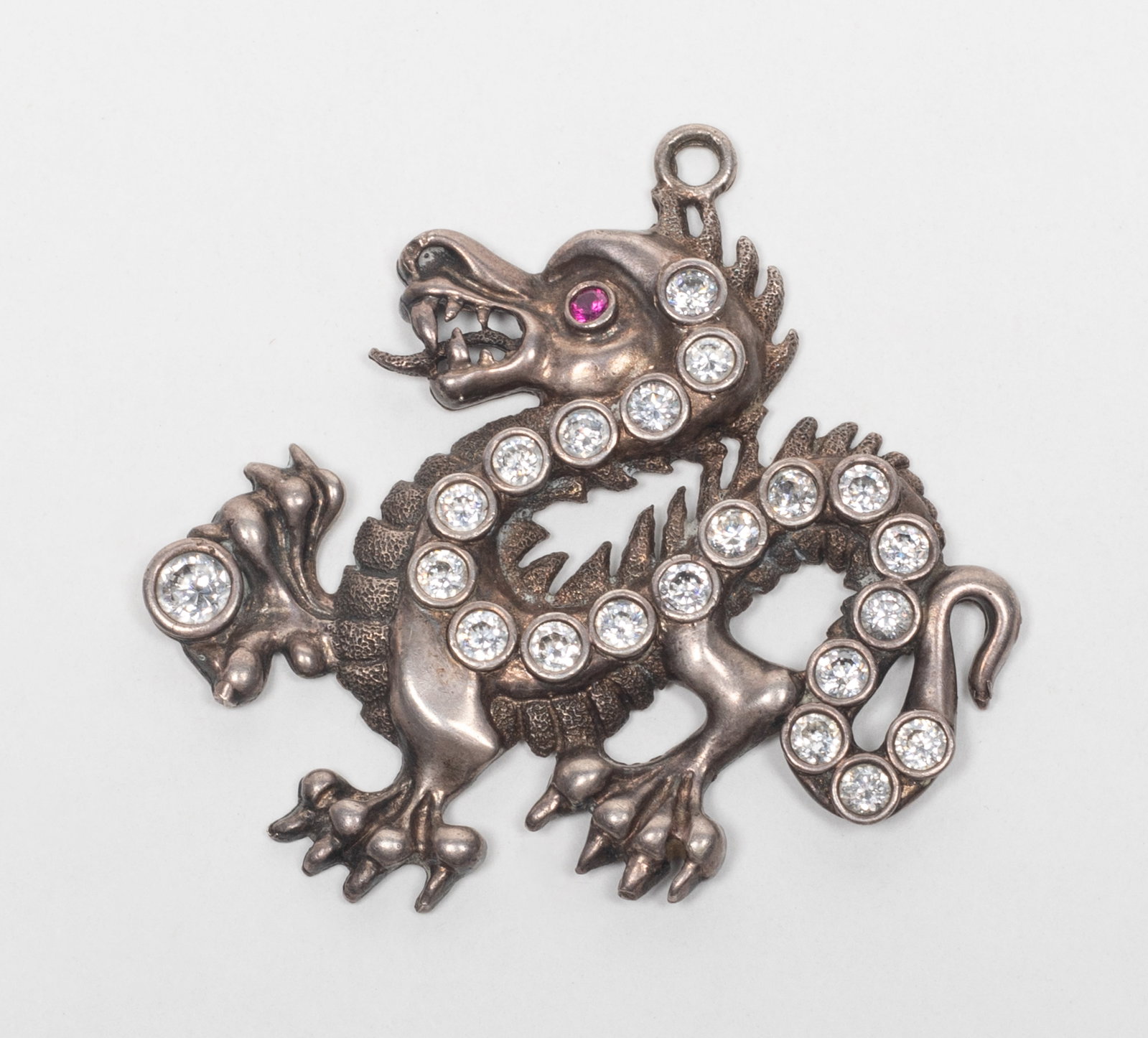 Lg Vtg. Sterling Silver Dragon Pendant: Large sterling silver dragon pendant. marked 925 1OFAKINO. Approx. 14.1 gram, 2.1*2.1 inch.