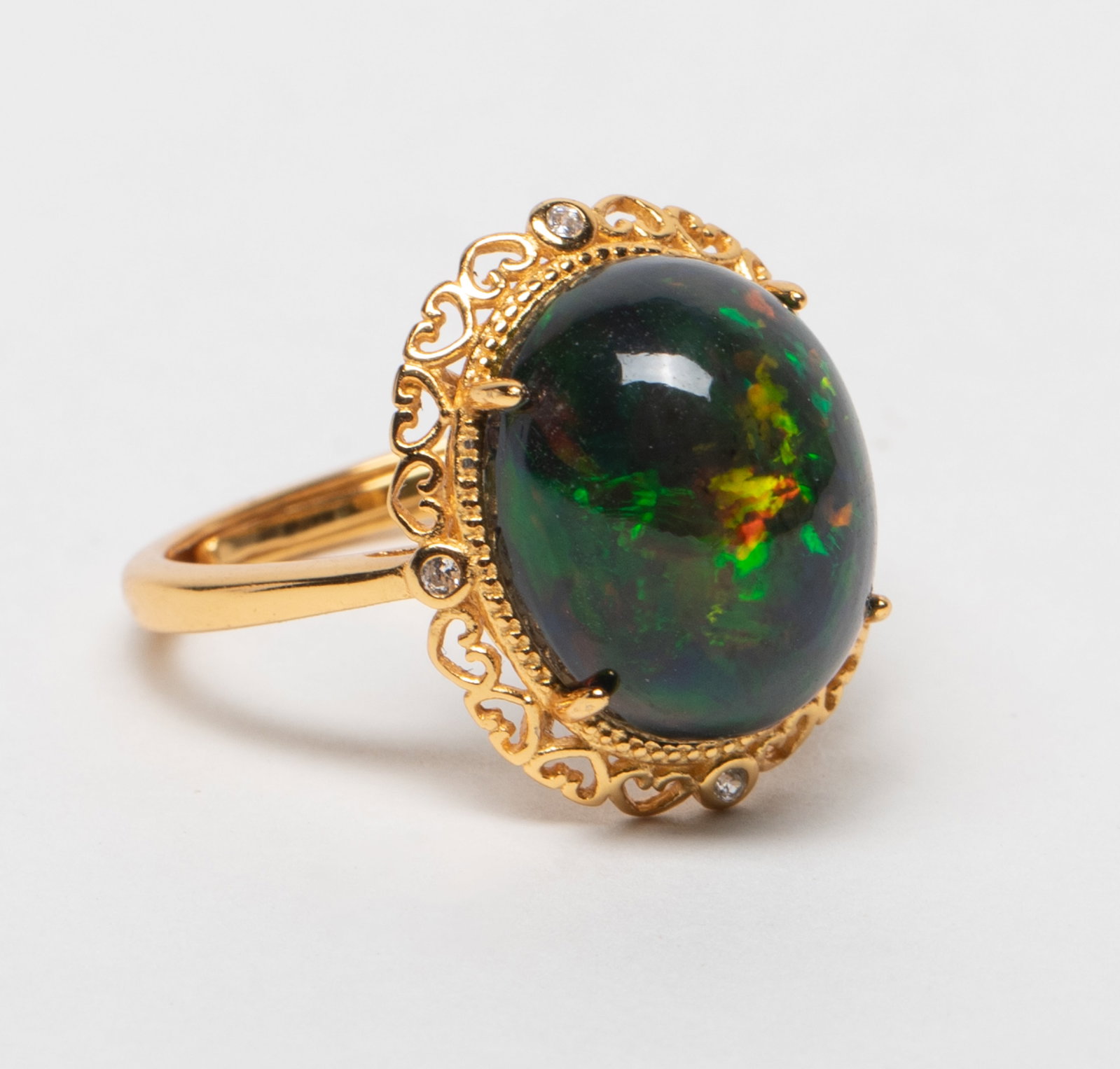 Unusual Large Stone, Fire Opal Ring: Adjustable ring inlaid with large fire opal stone. Approx. 2.84 gram. US size: 7.
