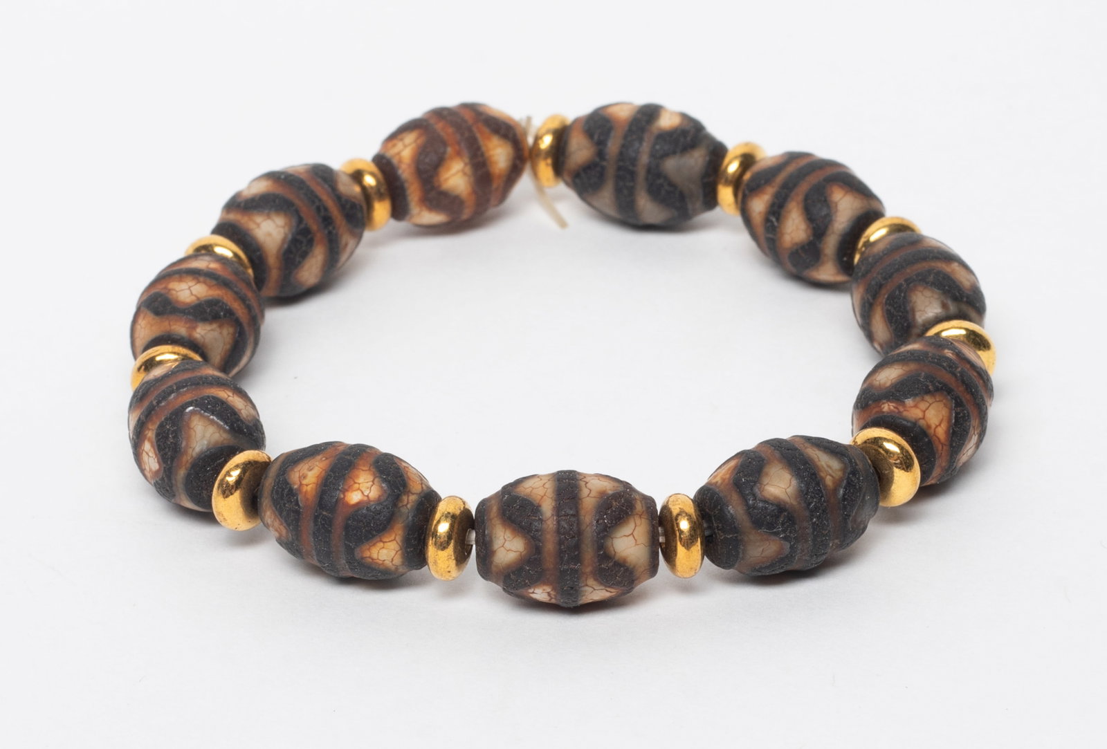 Chinese Fossilized Dzi Beads Prayer Beads: A string of Chinese fossilized dzi bead prayer beads. Beads size varies.
