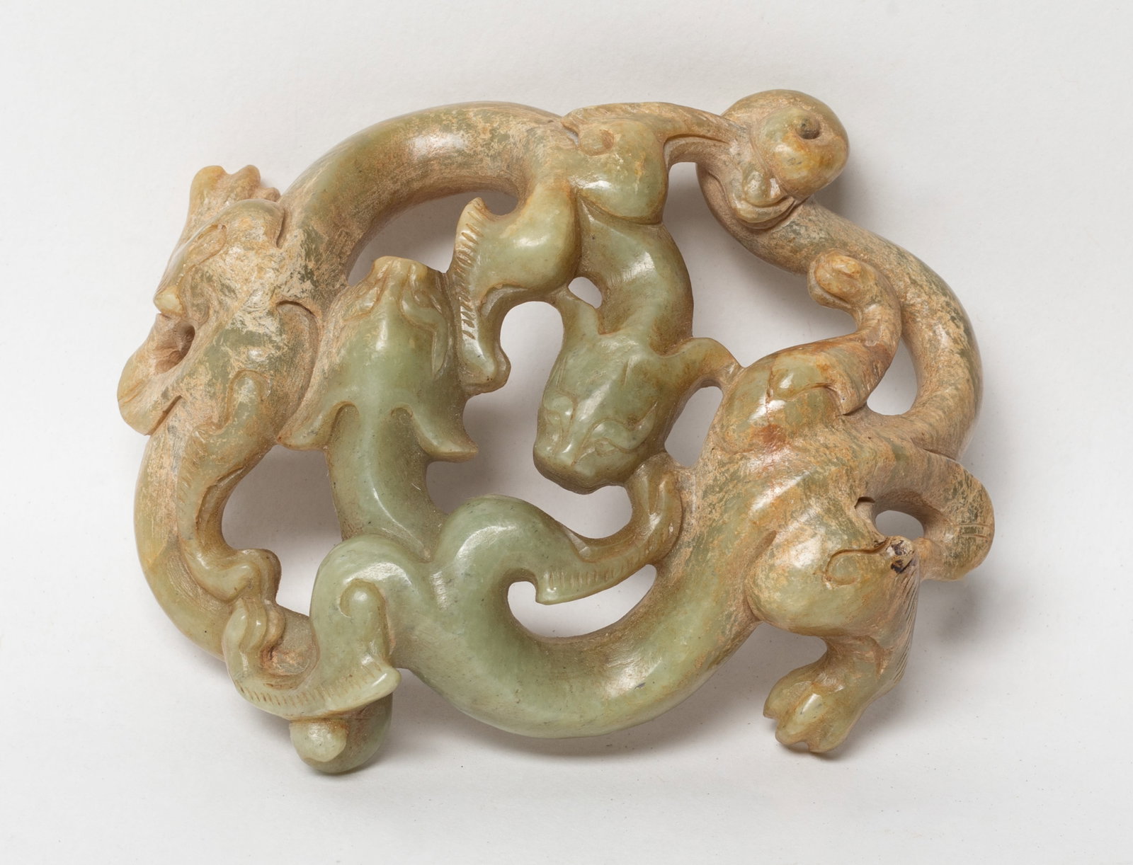 Lg Chinese Sung/ Ming Type Russet Jade Dragon: Large Chinese russet jade sculpture carved as a pair of sinuous chi dragons. Approx. 3.9*3.1 inch.