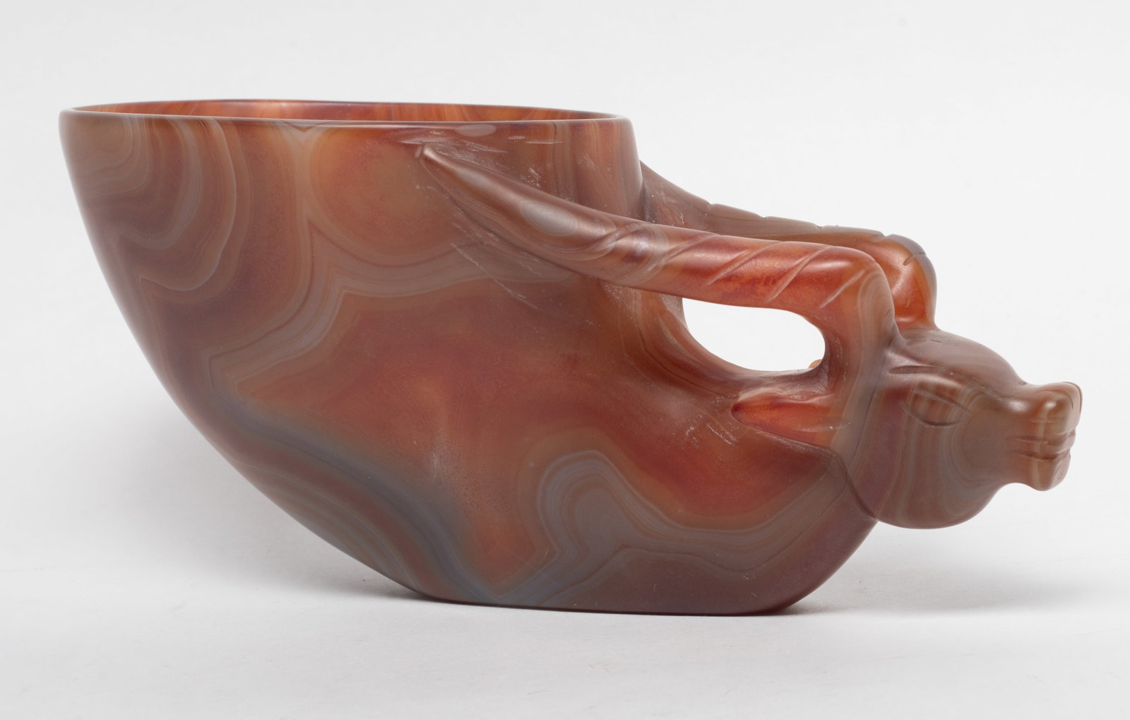Estate Chinese Cameo Agate Cup: Chinese cameo agate carved with a goat head forming as handle. Approx. 7*3.3*3 inch.