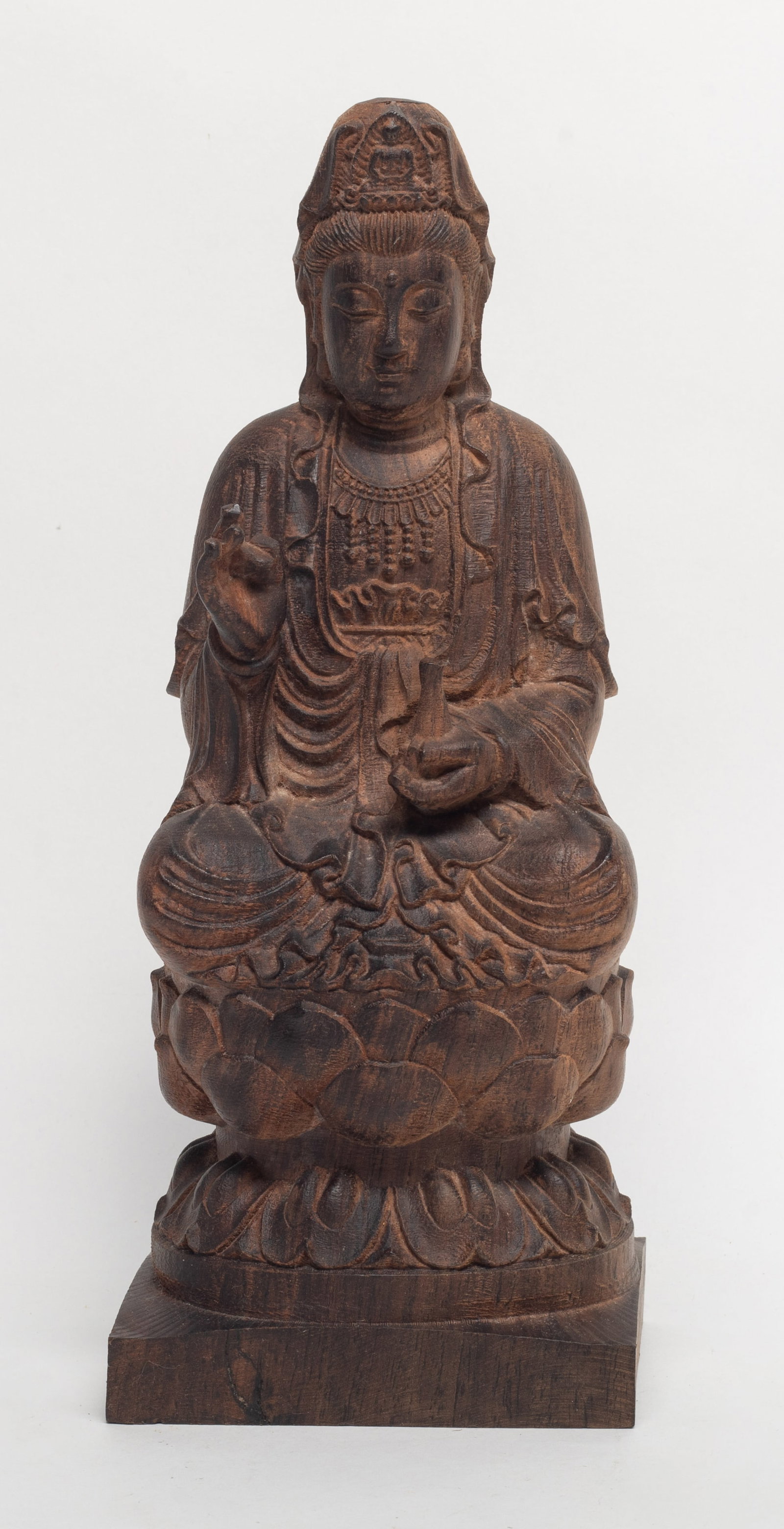 Vtg. Chinese Agarwood Carved Sculpture of Buddha: Chinese agarwood sculpture carved of seated Buddha form, the left hand holding bottle and right hand in karana mudra. Approx. 1342 gram, 10.6*4.2*3.5 inch.