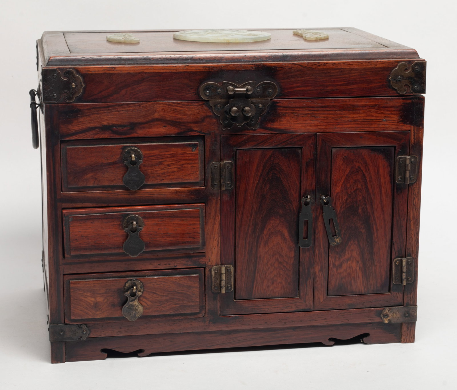 Large Chinese Wood Jewelry Box w/ Jade Decors: Large Chinese wood jewelry box decorated on the top with jade carvings carved with flowers, fruits and birds. Approx. 11.4*9.2*7.8 inch.