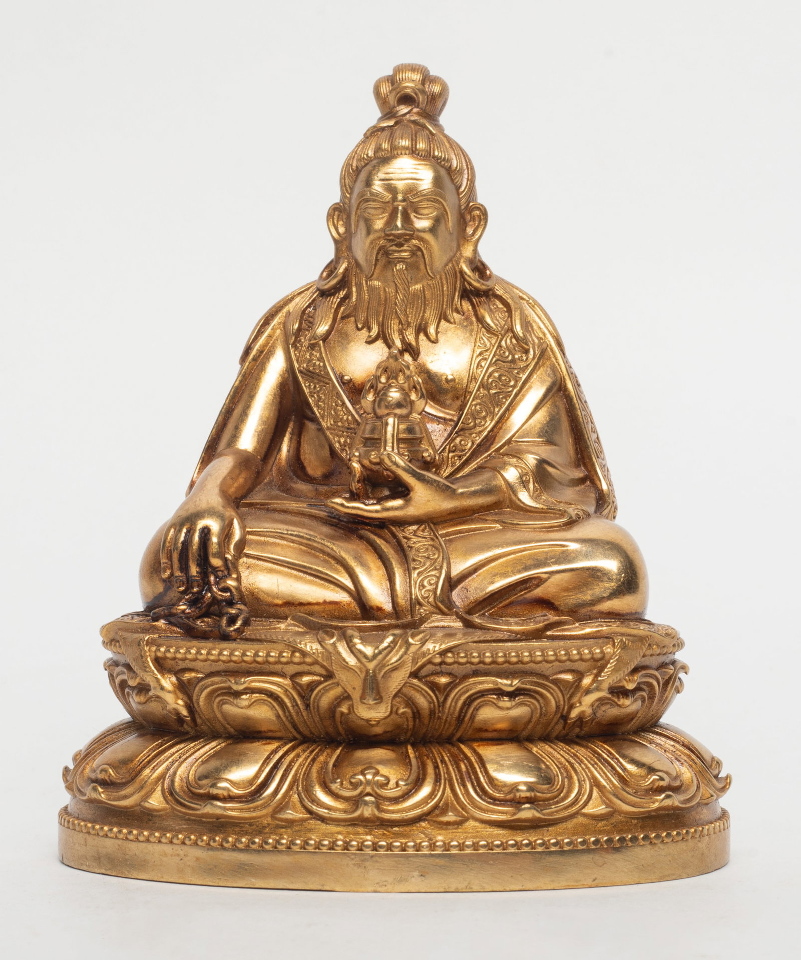 Estate Chinese Gold on Bronze Sculpture of Buddha: Chinese gold on bronze sculpture of seated Buddha, the hands holding attributes. Approx. 3.9*3.3*2.5 inch.