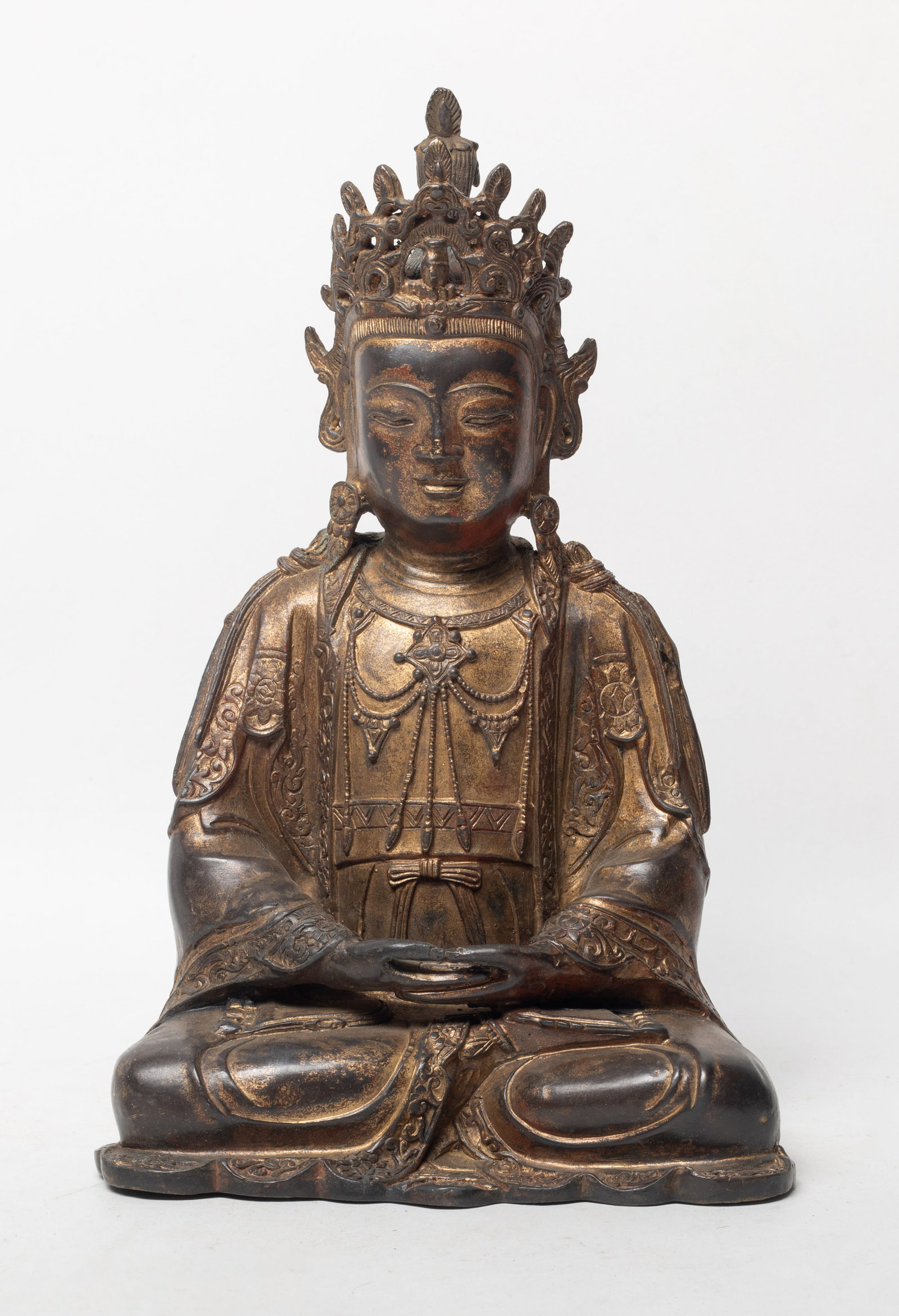 Estate Chinese Gilt Bronze Buddha Sculpture: Chinese hollow gilt bronze seated Buddha sculpture, the hands in dhyana mudra. Approx. 11.5*7.3*4.1 inch. The Estate of the Store Closed Sale. DTLA. 2019.