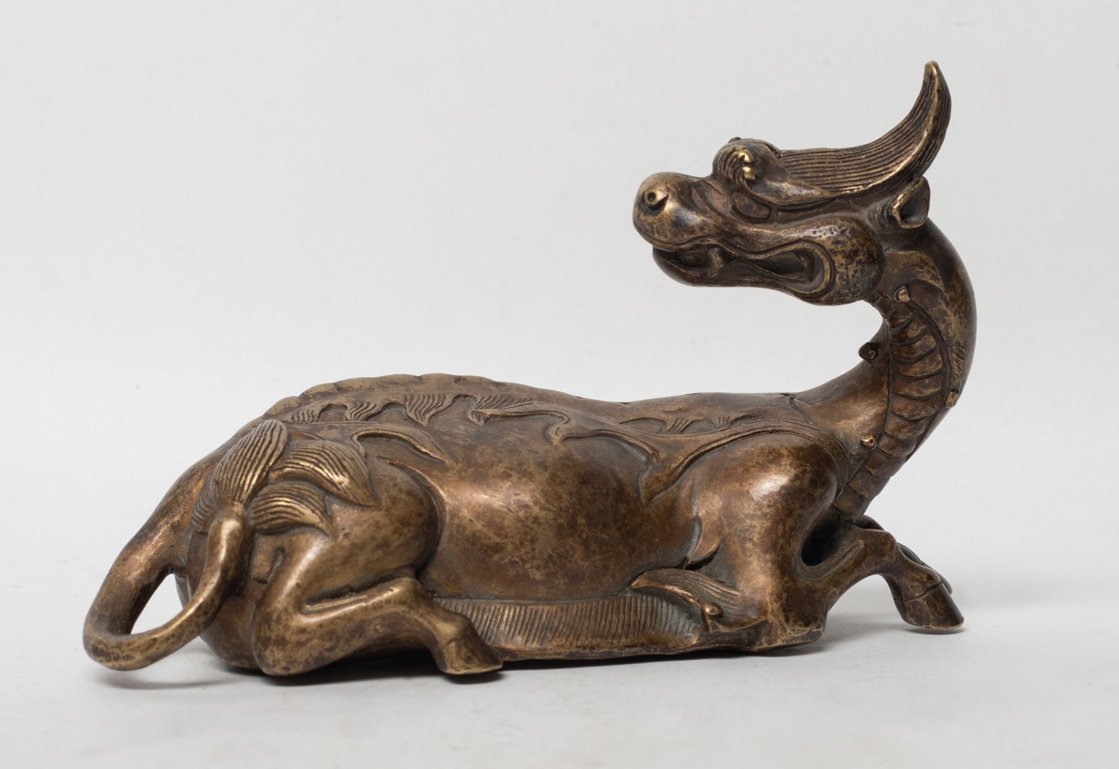 Estate Chinese Ming Type Bronze Sculpture: Chinese bronze sculpture cast of recumbent mythical beast form. Approx. 6.2*3.9*2.6 inch.