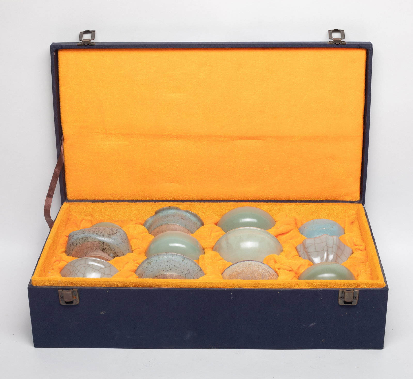 Large Set Chinese Porcelain Tea Cups Collection: Ser of 12 Chinese glazed porcelain tea cups, with box. Approx. 3.8*3.8*1.7 inch (largest). The Estate of the Judy. H. Chang. SF. 2005.