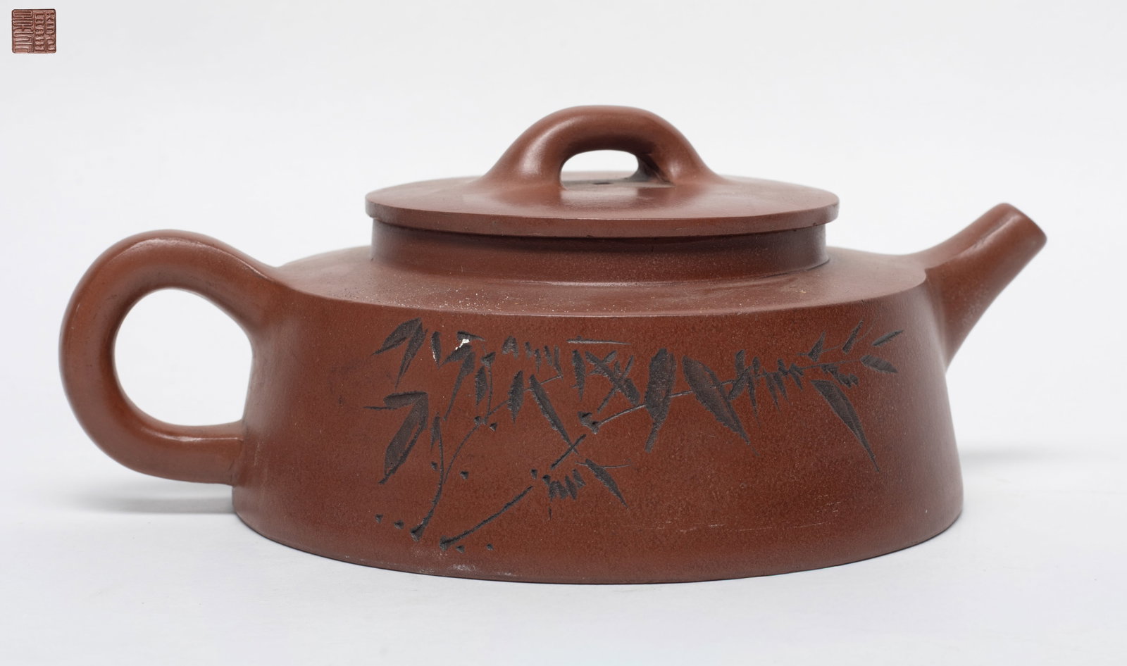 Vintage Chinese Yixing Zisha Tea Pot: Chinese Yixing zisha tea pot carved bamboo and poem, with mark on lid interior and pot bottom. Approx. 7.2*5.4*2.9 inch.