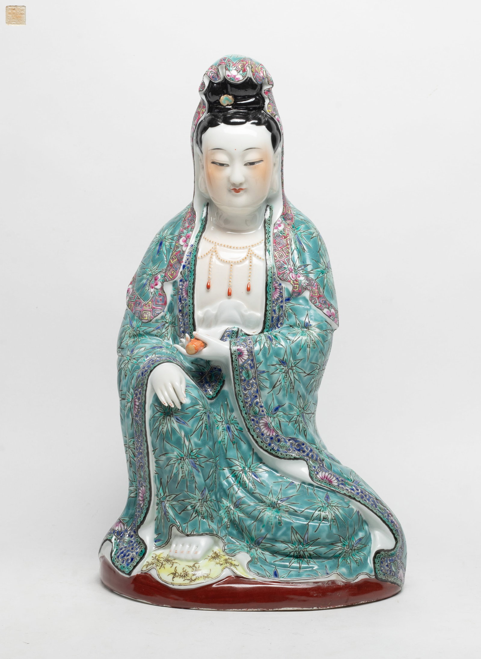 Tall Chinese Famille Rose Porcelain Kuanyin: Chinese famille rose porcelain seated Kuanyin sculpture, incised a seal mark on the bottom. Approx. 14.2*8.1*6 inch.