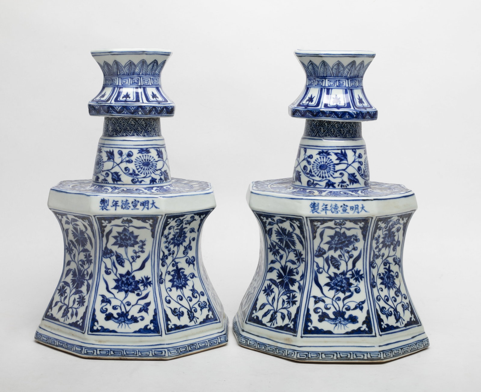 Two Large Chinese Porcelain Lamp/ Holder: Two large special form Chinese blue and white porcelain lamp / candlestick holder, decorated with traditional patterns, each marked six characters. Approx. 11.2*8 inch.