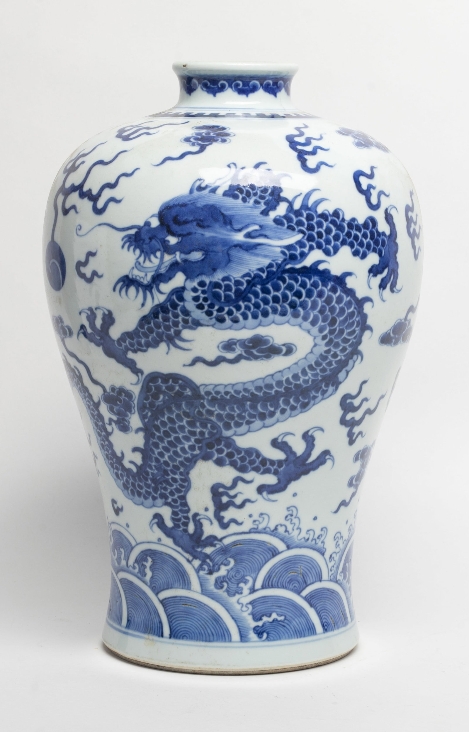 Estate Chinese Porcelain Dragon Vase: Chinese blue and white porcelain vase painted with dragon and fish amongst clouds and waves. Approx. 12.3*7.7 inch.