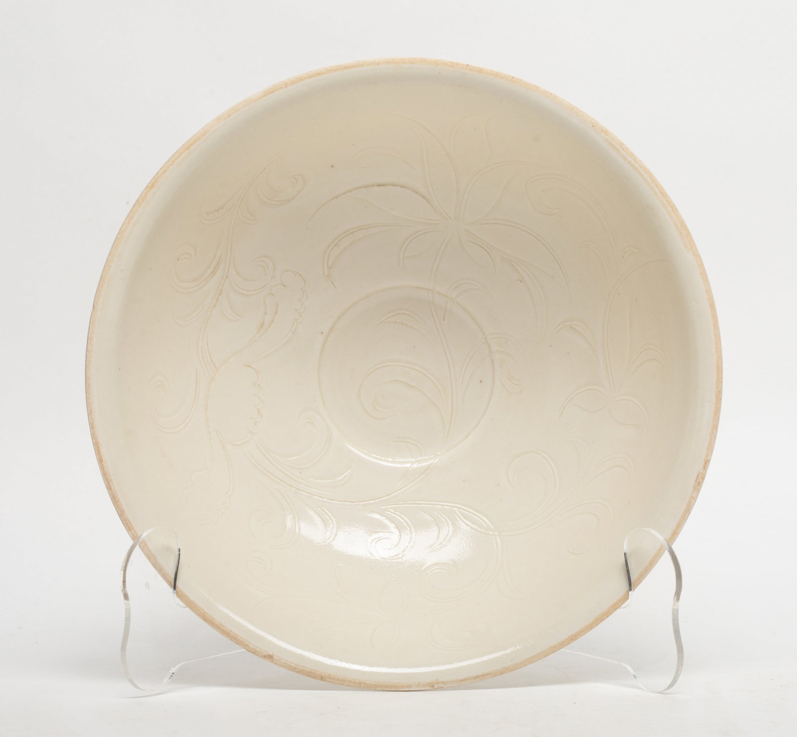 Large Chinese Ding Carved Porcelain Bowl: Chinese Ding type creamy glazed porcelain bowl. Approx. 7.8*2.5 inch.